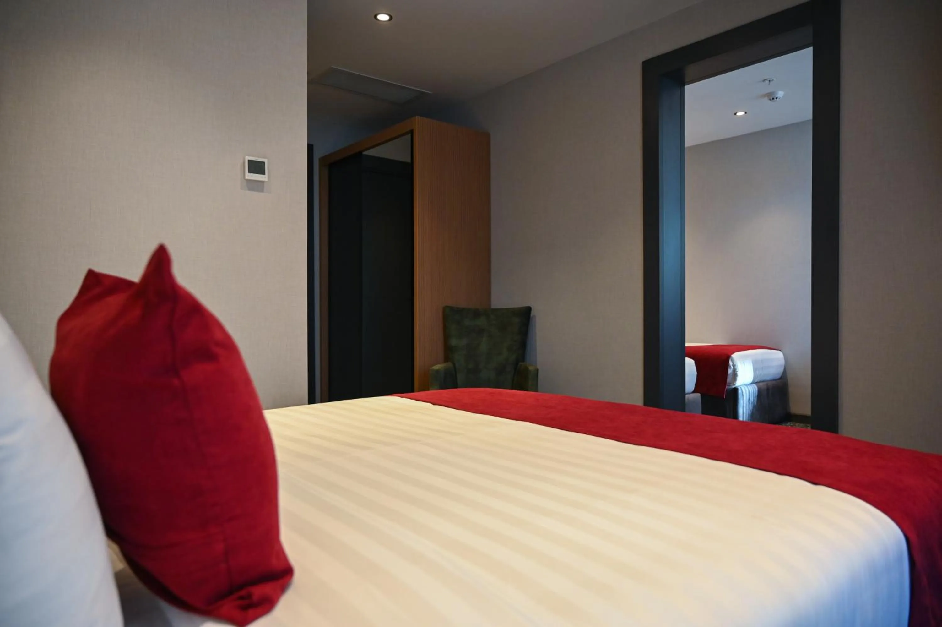 Photo of the whole room, Bed in Landmark Hotel