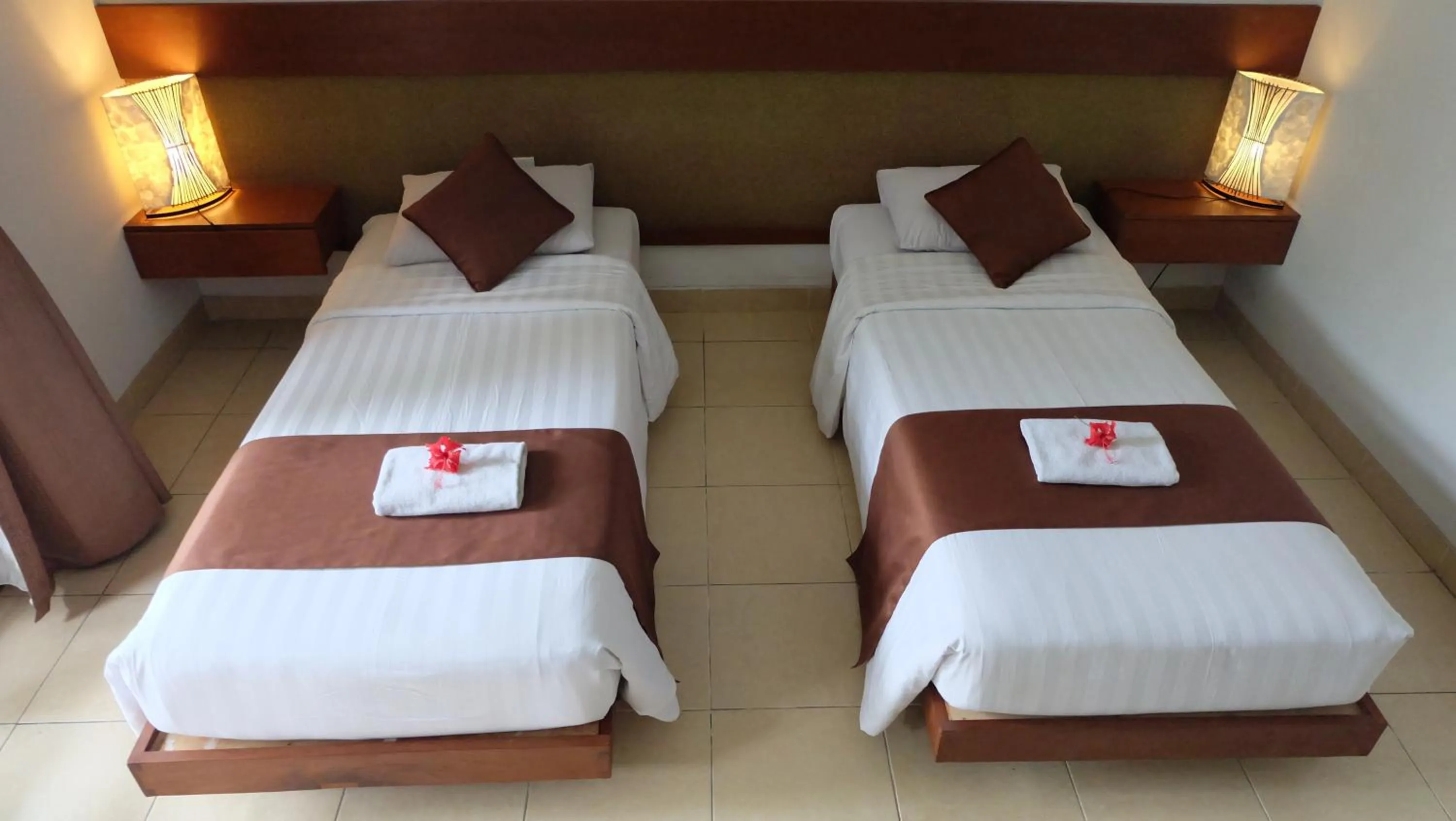 Bed in Semarandana Bedrooms and Pool