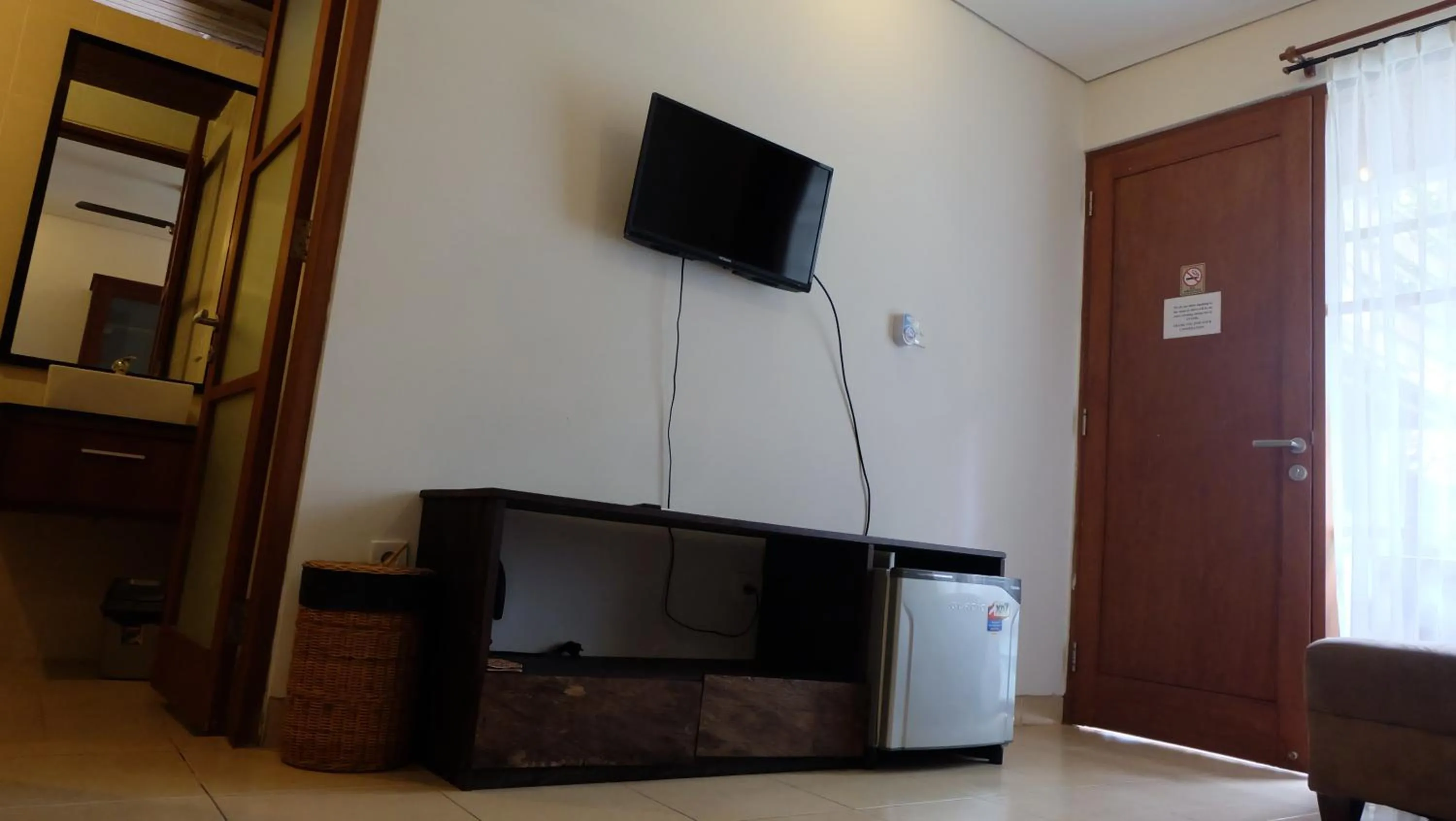 Communal lounge/ TV room in Semarandana Bedrooms and Pool