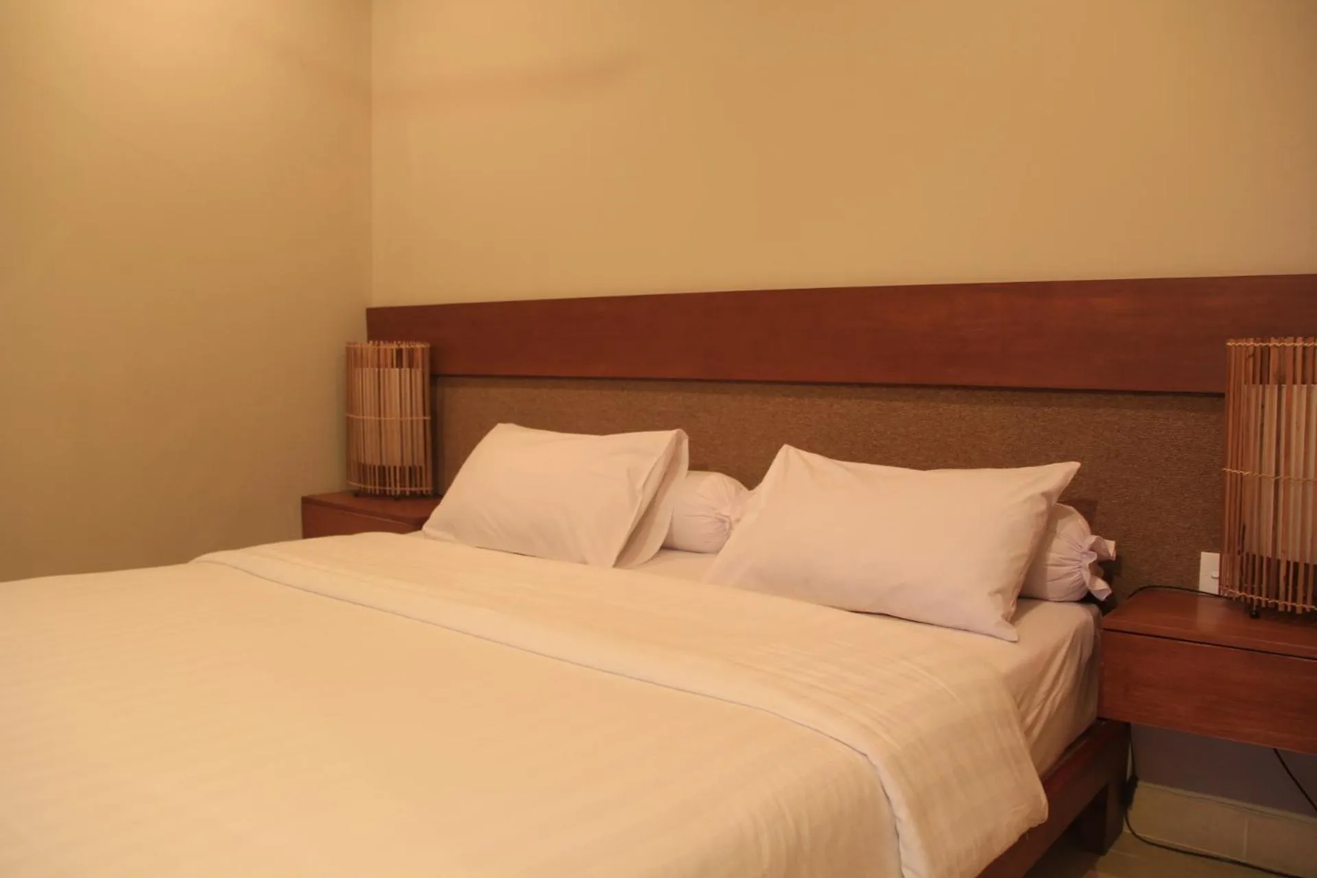 Bed in Semarandana Bedrooms and Pool