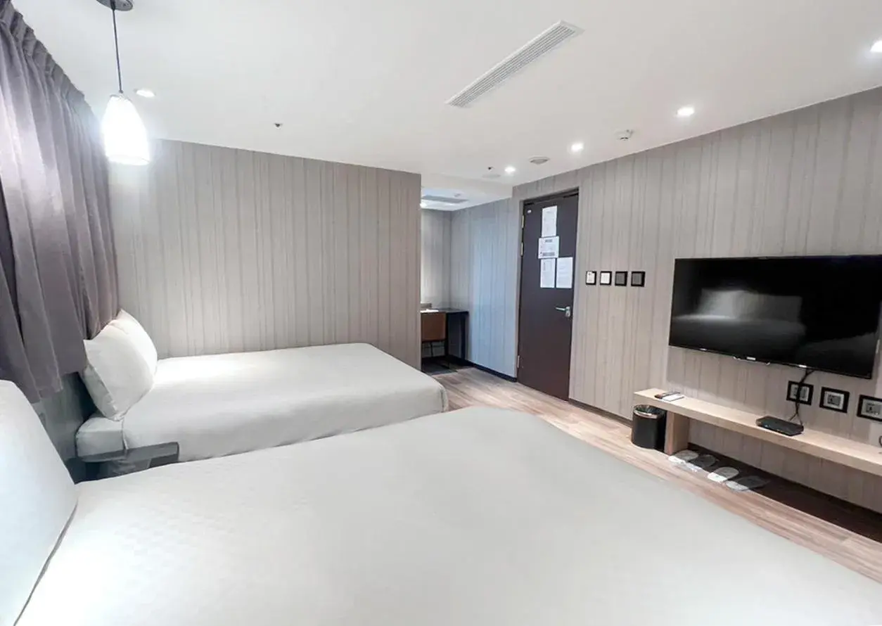 Bed in 綺樂文旅 開封館 Le Room Hotel Kaifeng Bed in 綺樂文旅 開封館 Le Room Hotel Kaifeng