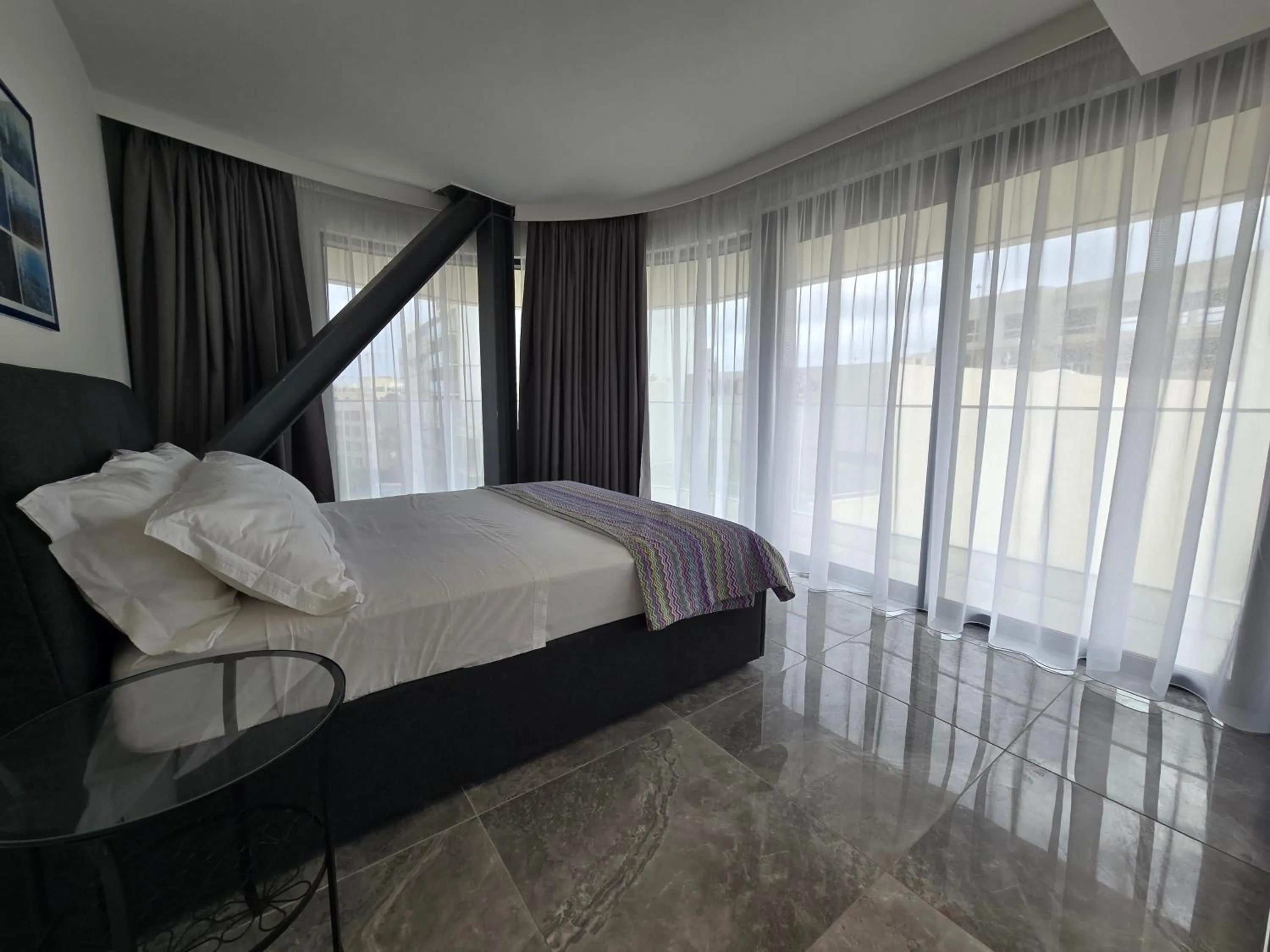 Bed in Mercury Suites - Skydream Getaways