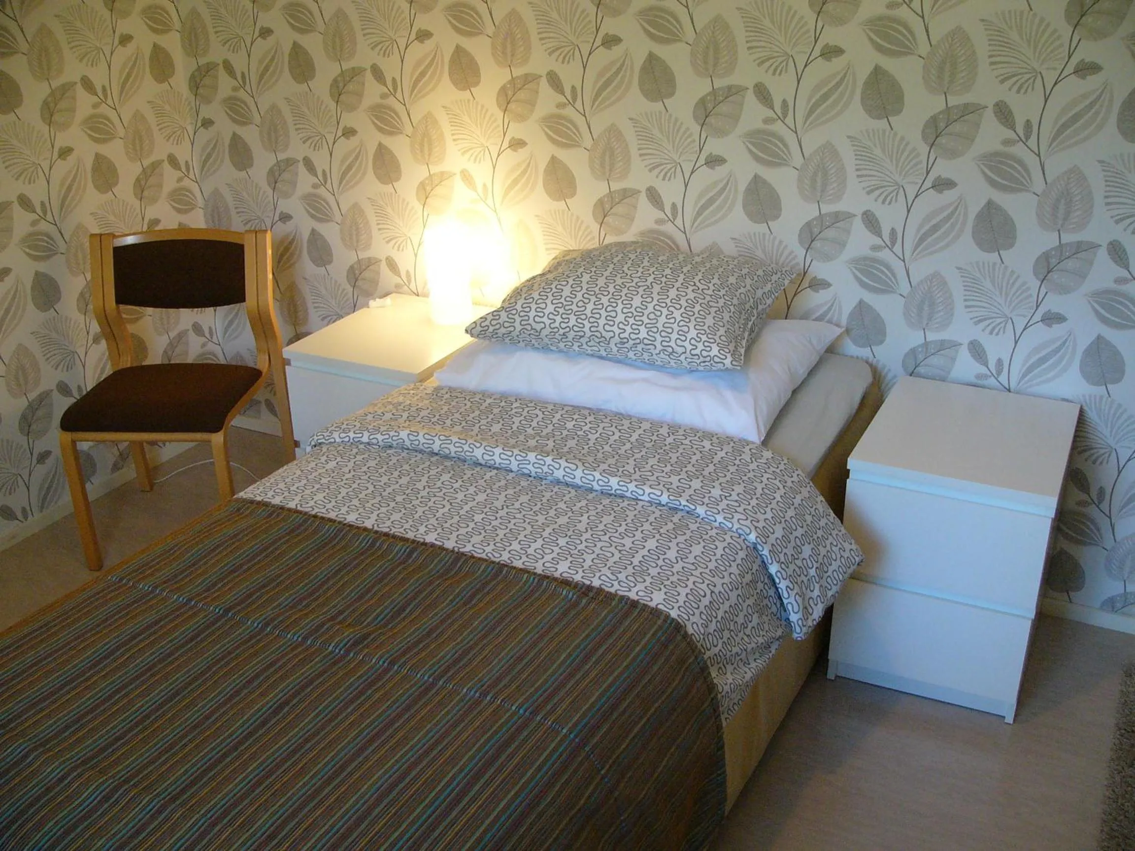 Photo of the whole room, Bed in Hotelli Aliisa