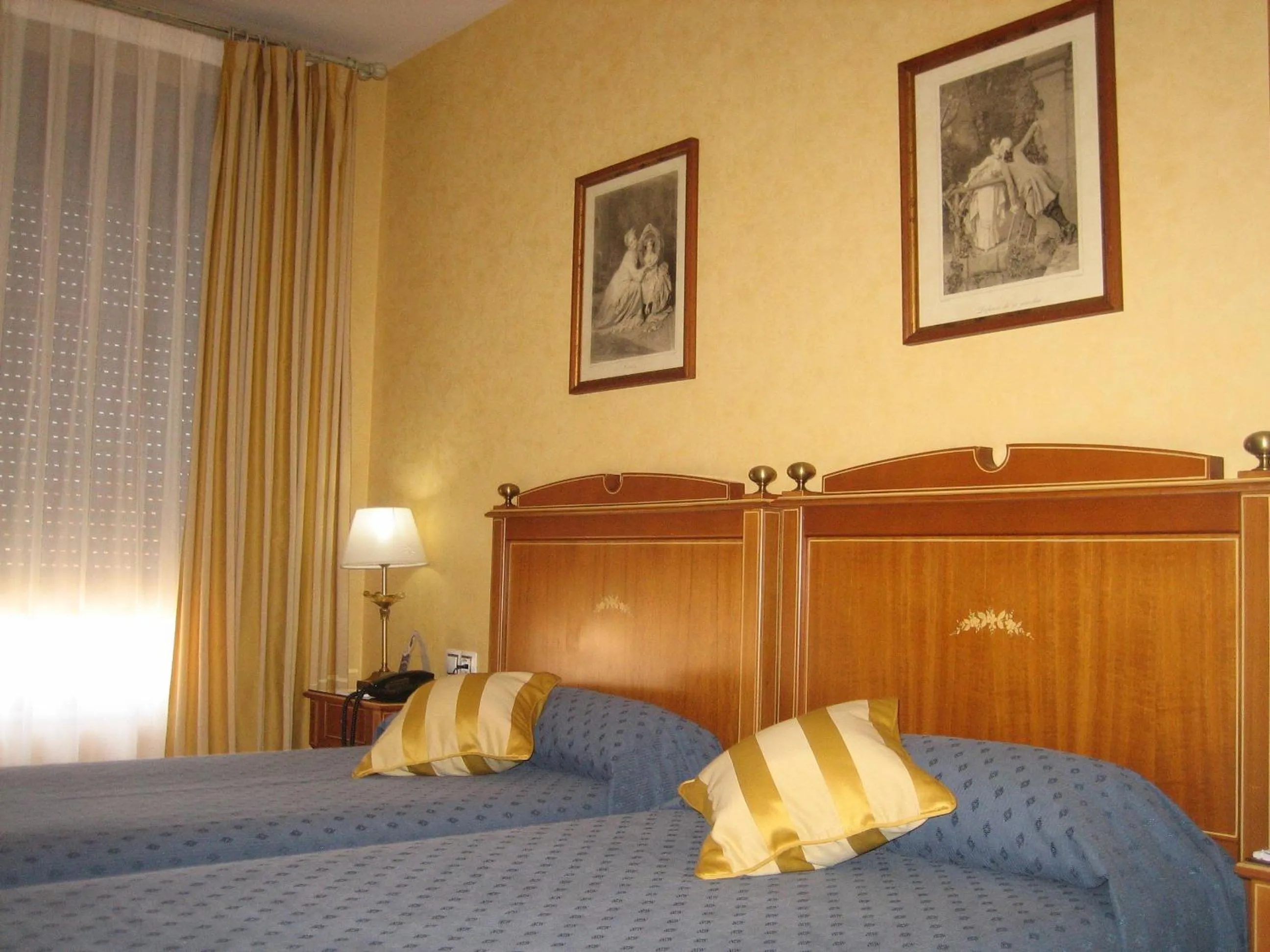 Bed in Hotel Santiago