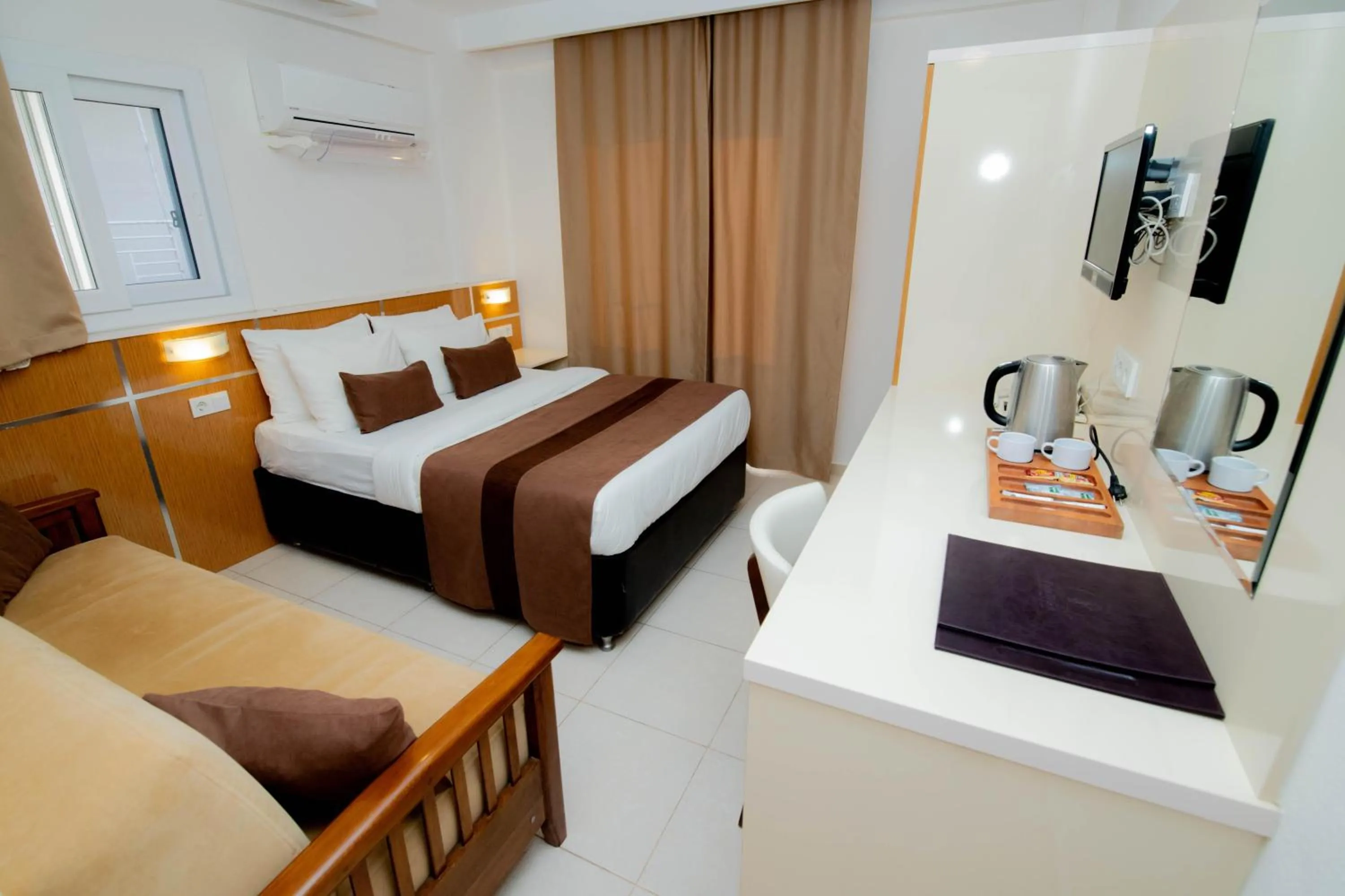 Bed in Palm Beach Hotel