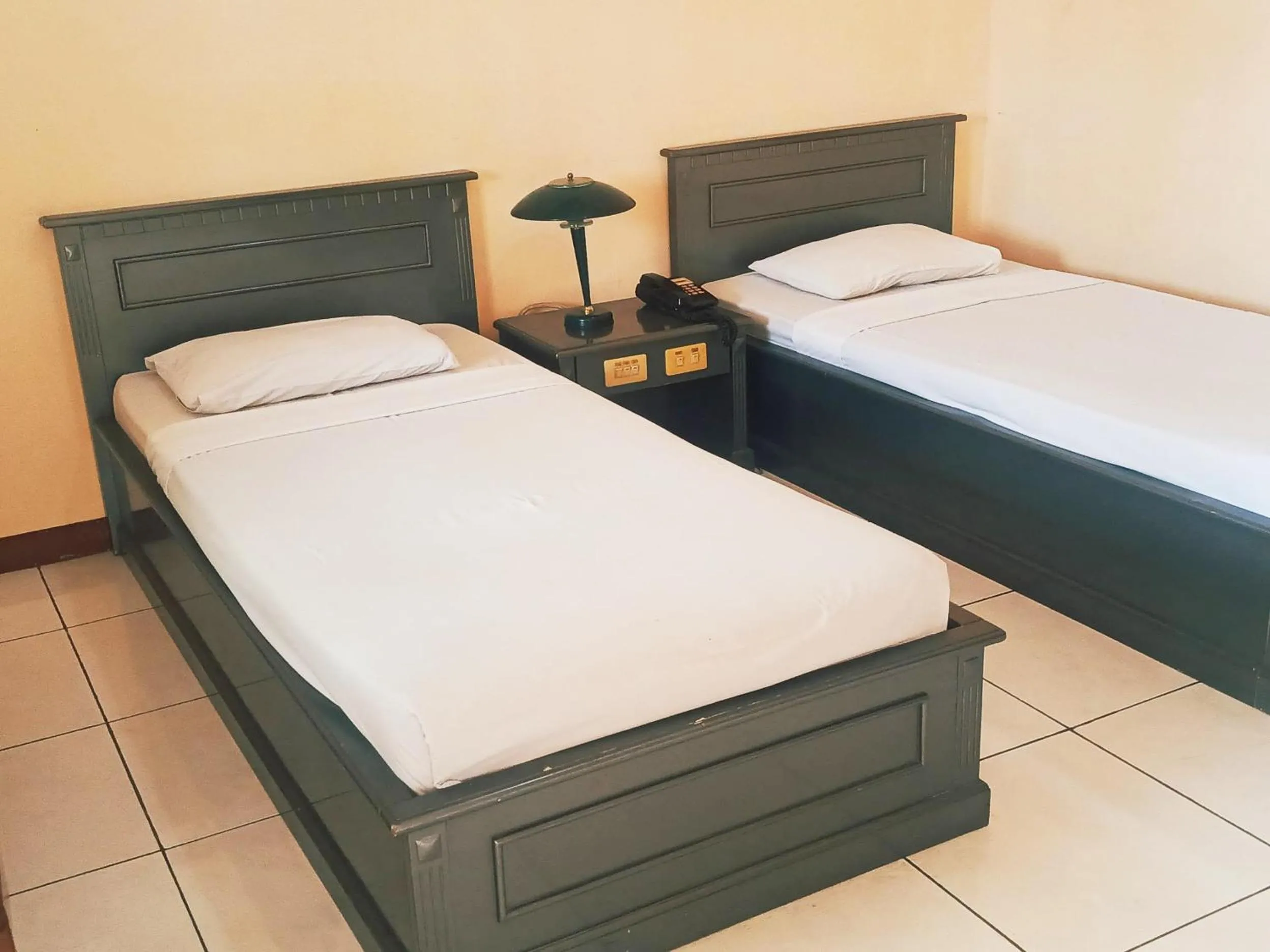 Bed in Hotel Wijaya Purwokerto
