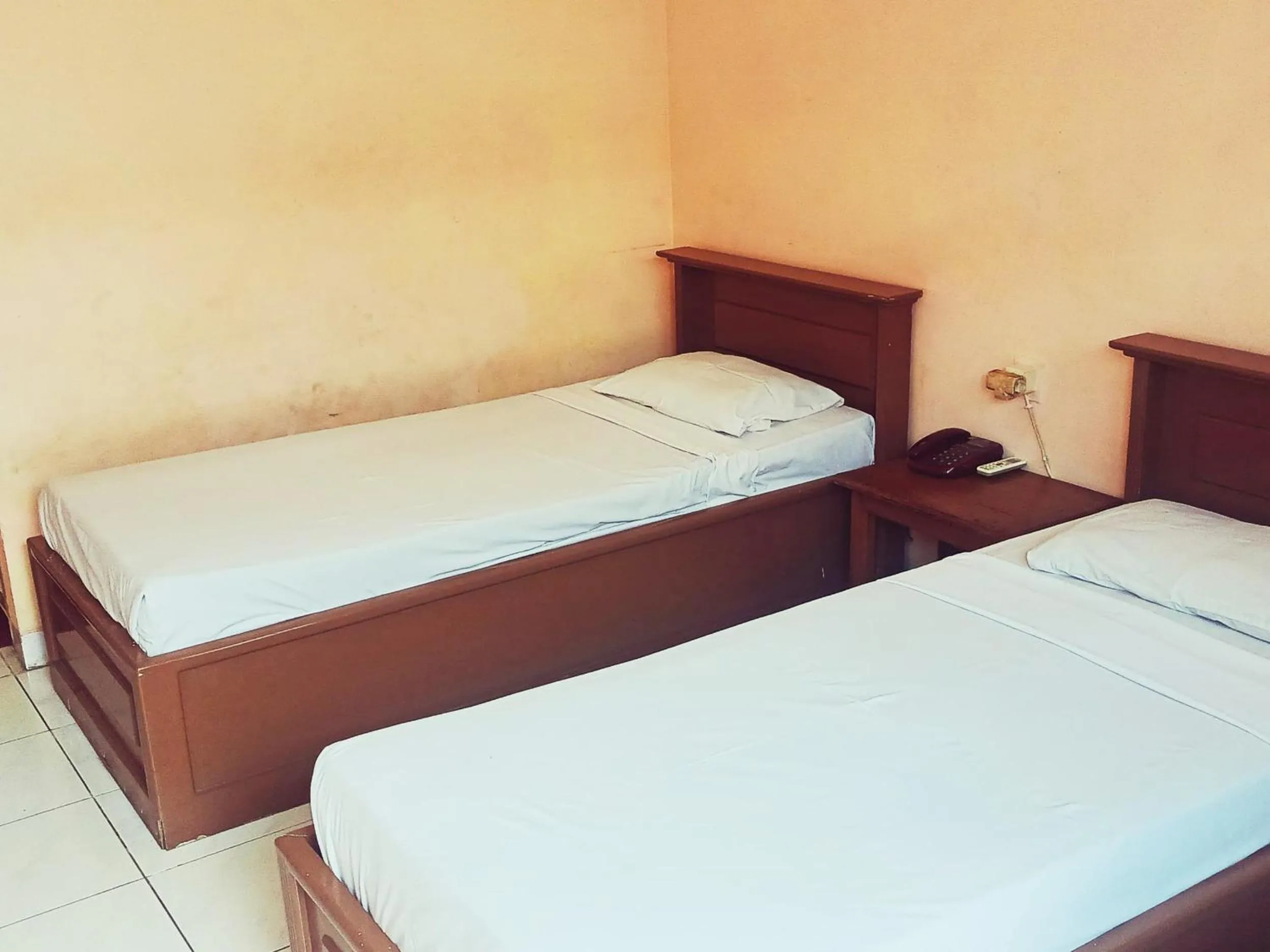 Bed in Hotel Wijaya Purwokerto