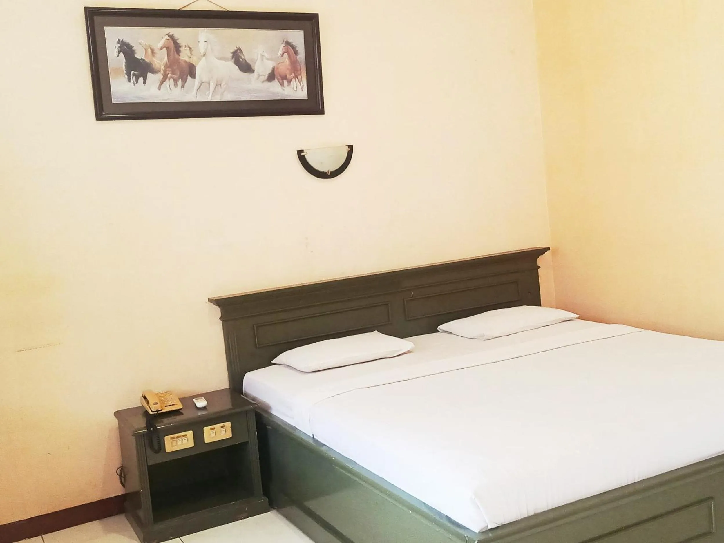 Bed in Hotel Wijaya Purwokerto