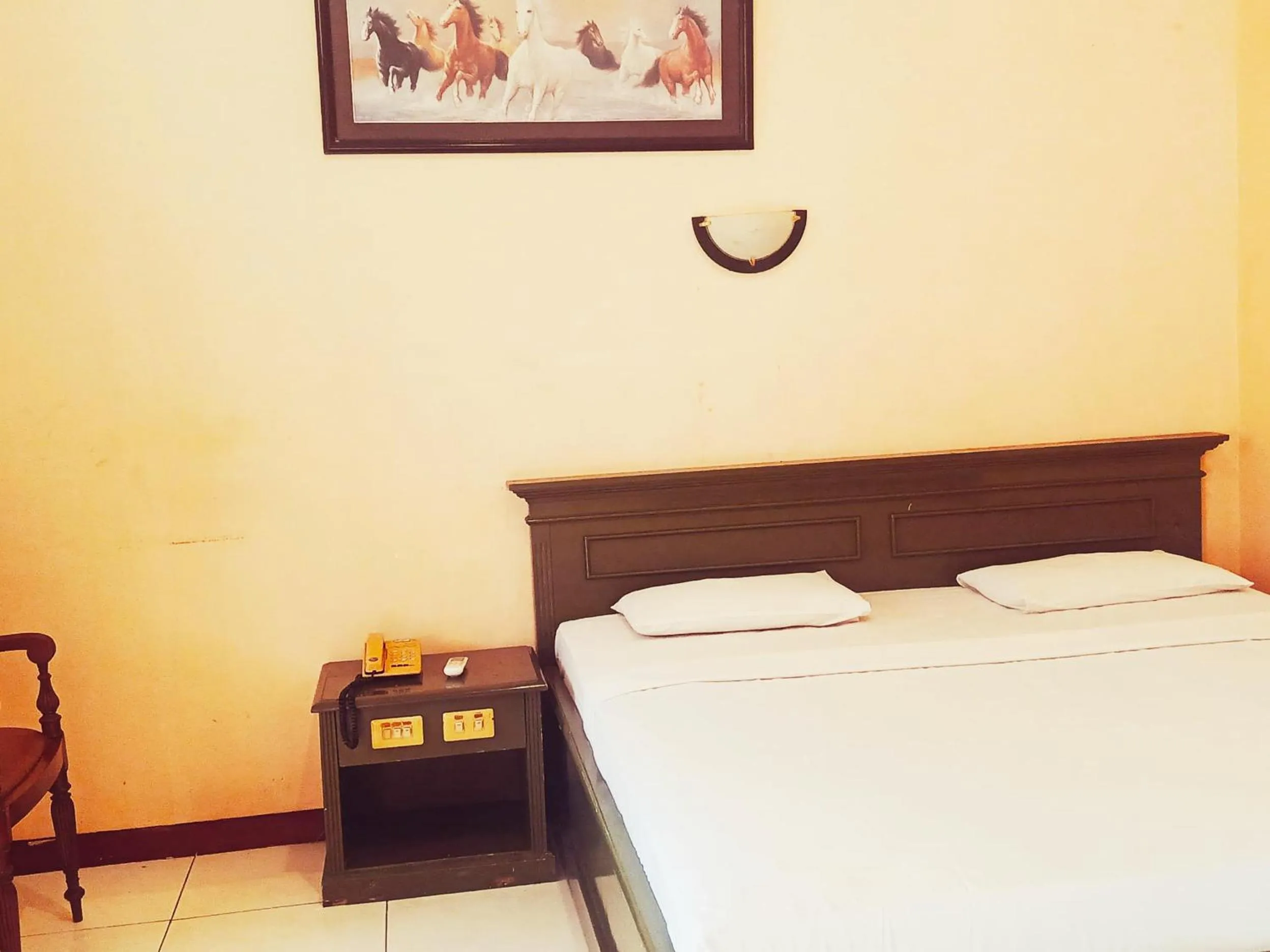 Bed in Hotel Wijaya Purwokerto