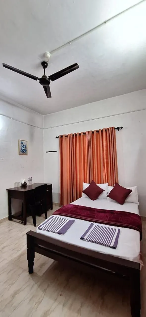 Bed in Holiday Apartments & Homestay