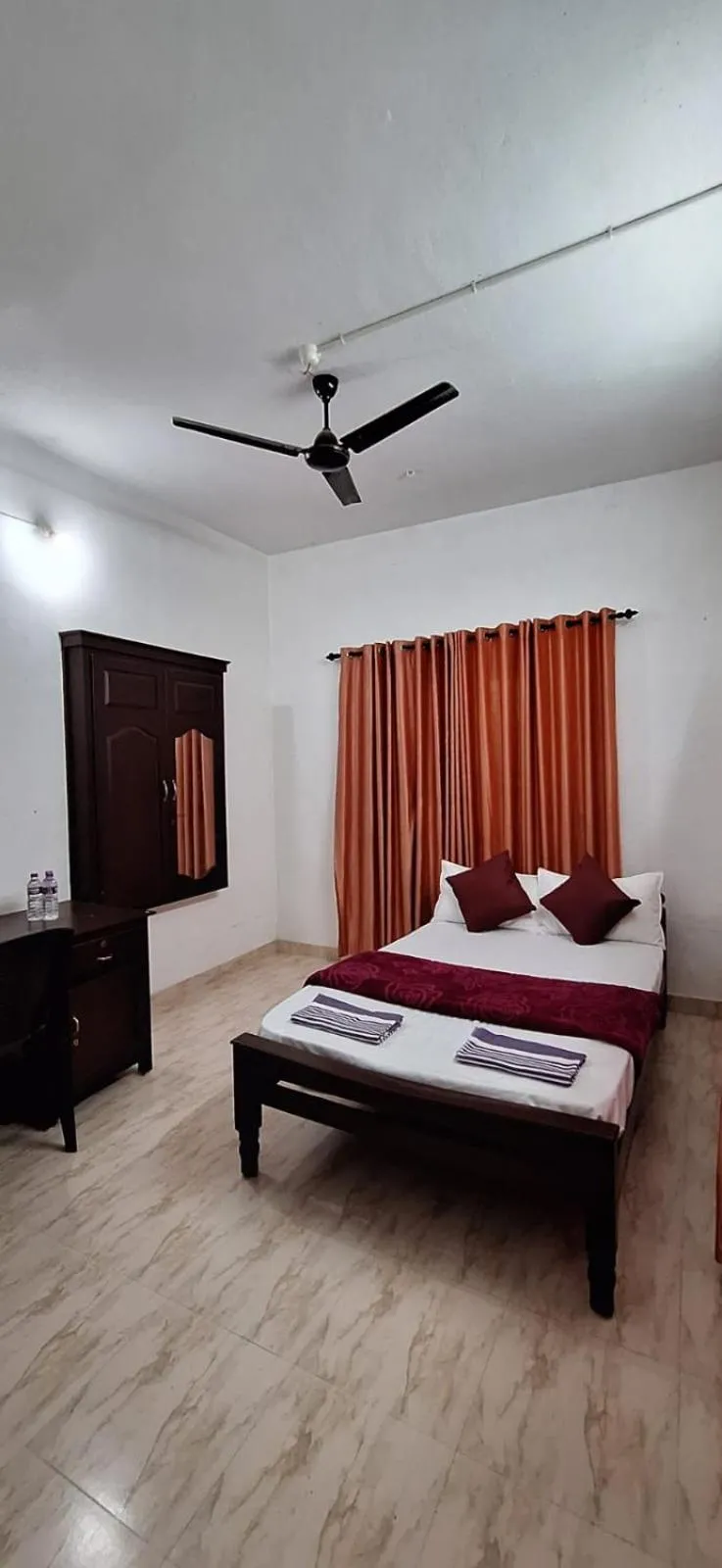Bed in Holiday Apartments & Homestay