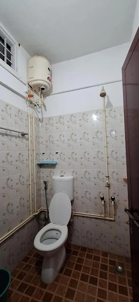 Toilet in Holiday Apartments & Homestay