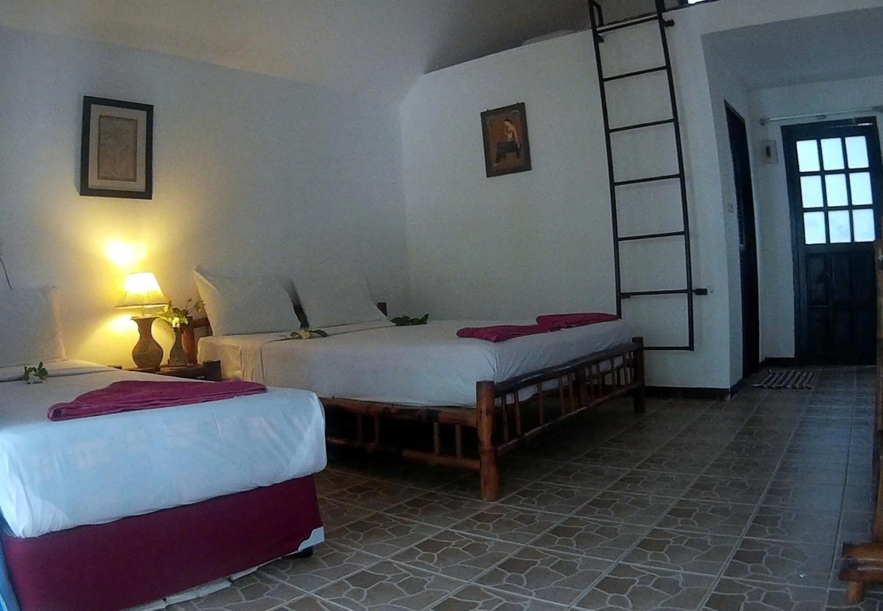 Bed in Poseidon Bungalows