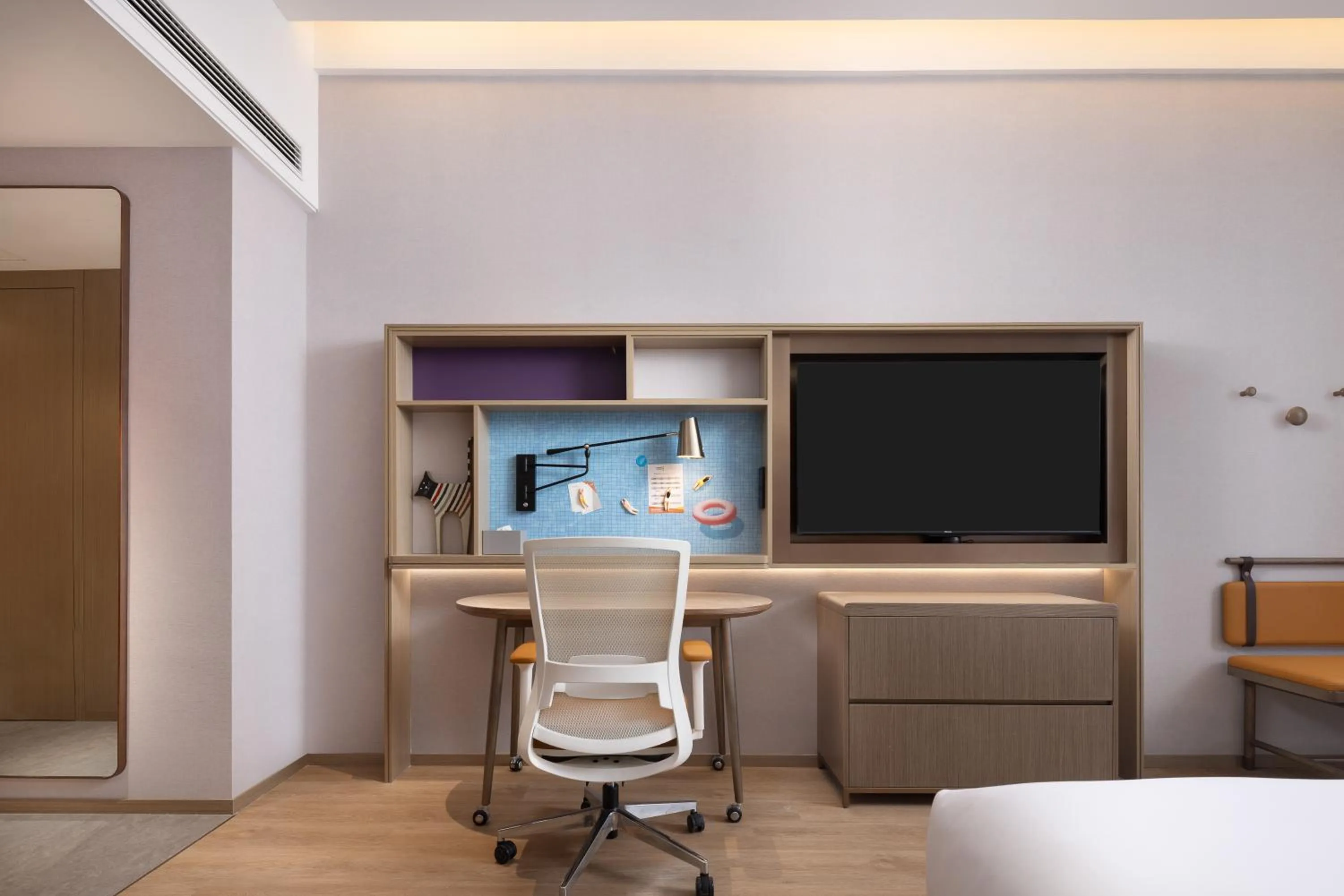 Seating area in Home2 Suite by Hilton Fuyang Taihe