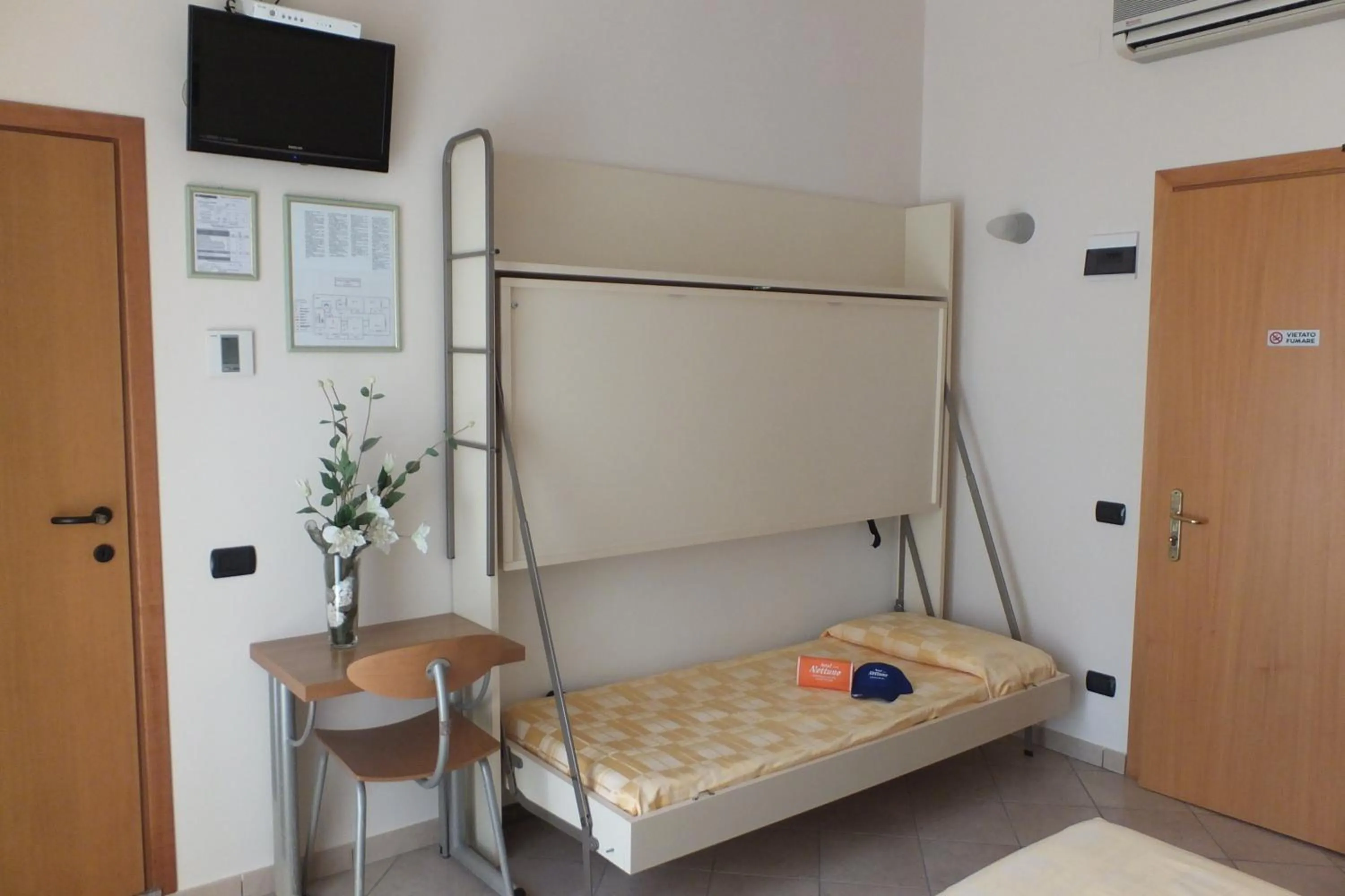 Bed in Hotel Nettuno