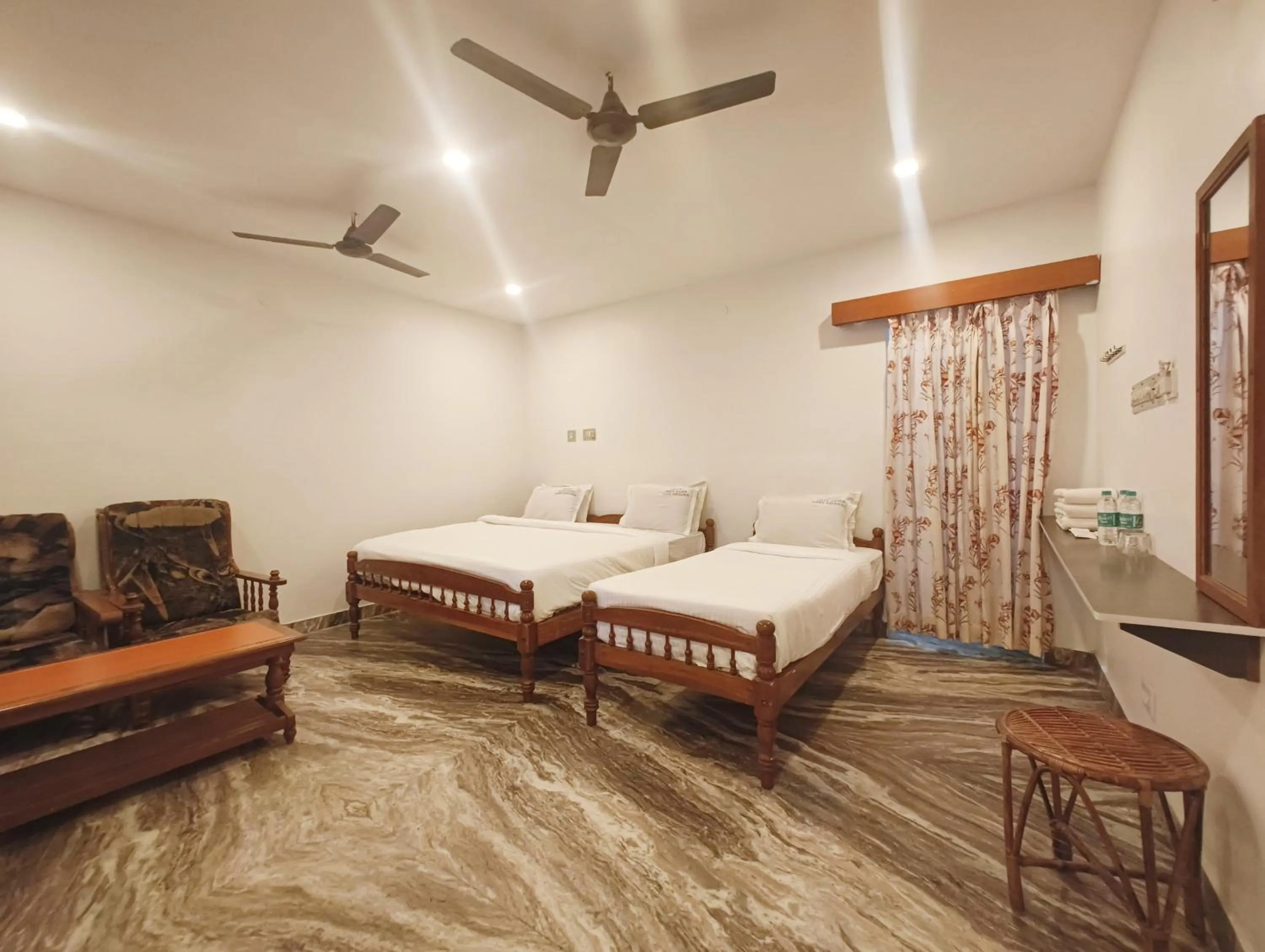 Photo of the whole room, Bed in Hare Rama Hare Krishna - EESHA Hotel