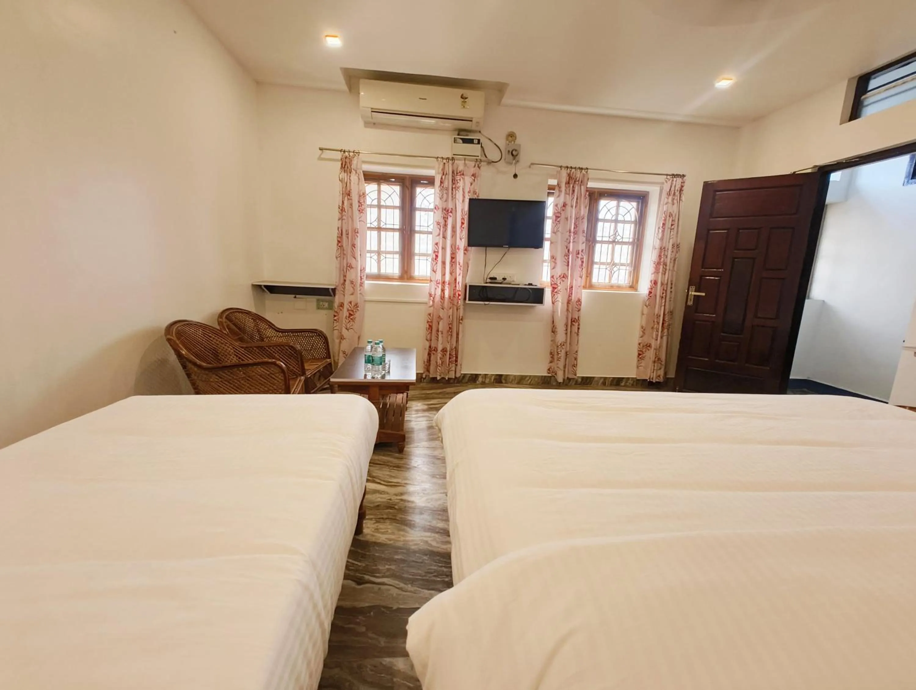 Bedroom, Bed in Hare Rama Hare Krishna - EESHA Hotel