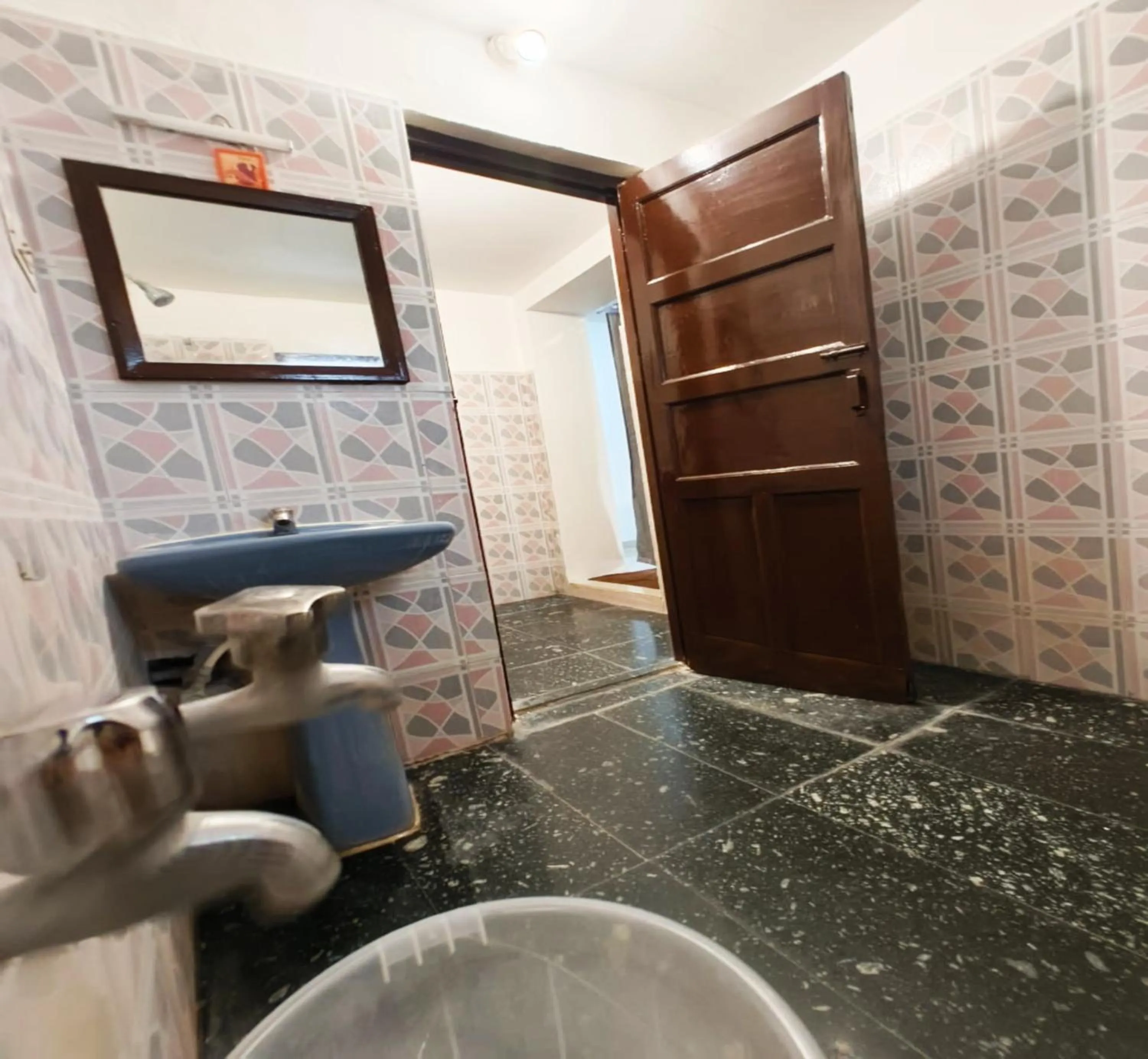 Bathroom in Hare Rama Hare Krishna - EESHA Hotel