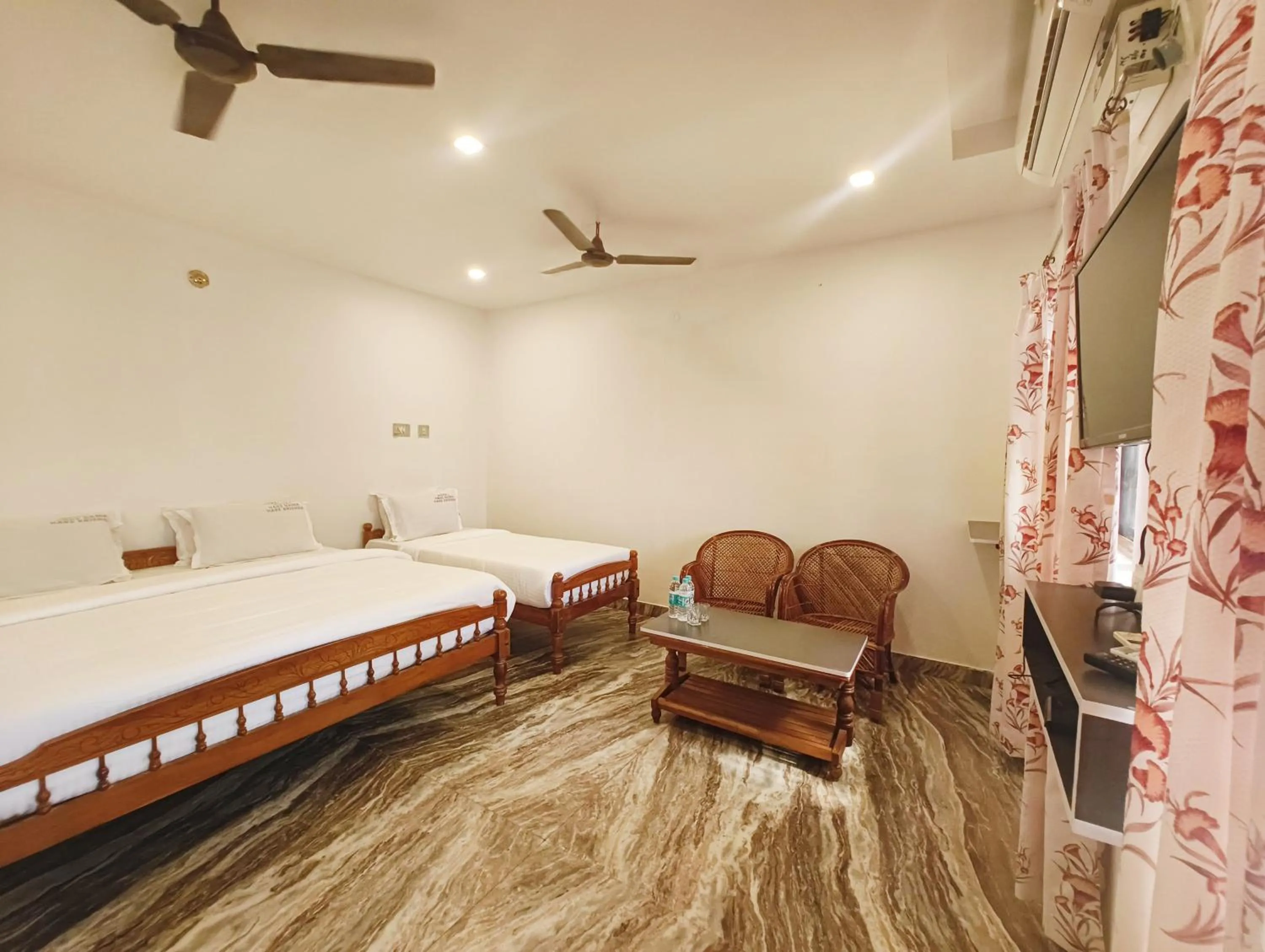 Photo of the whole room, Bed in Hare Rama Hare Krishna - EESHA Hotel