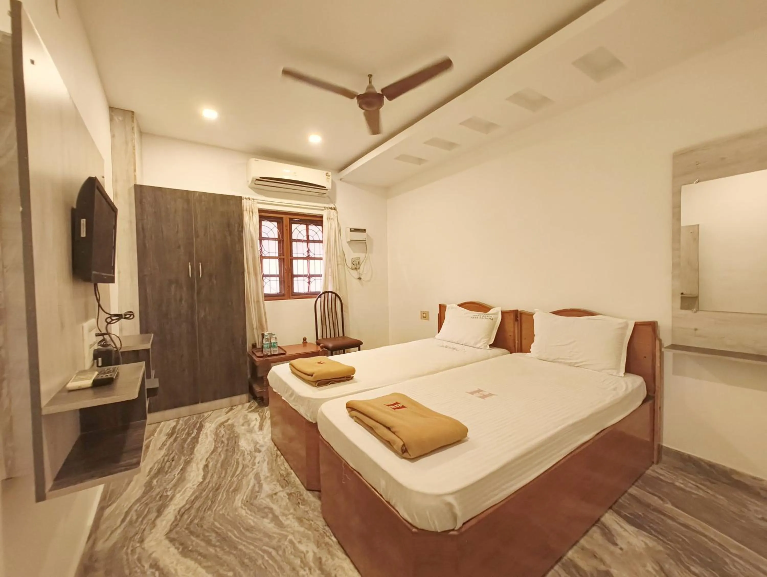 Bed in Hare Rama Hare Krishna - EESHA Hotel