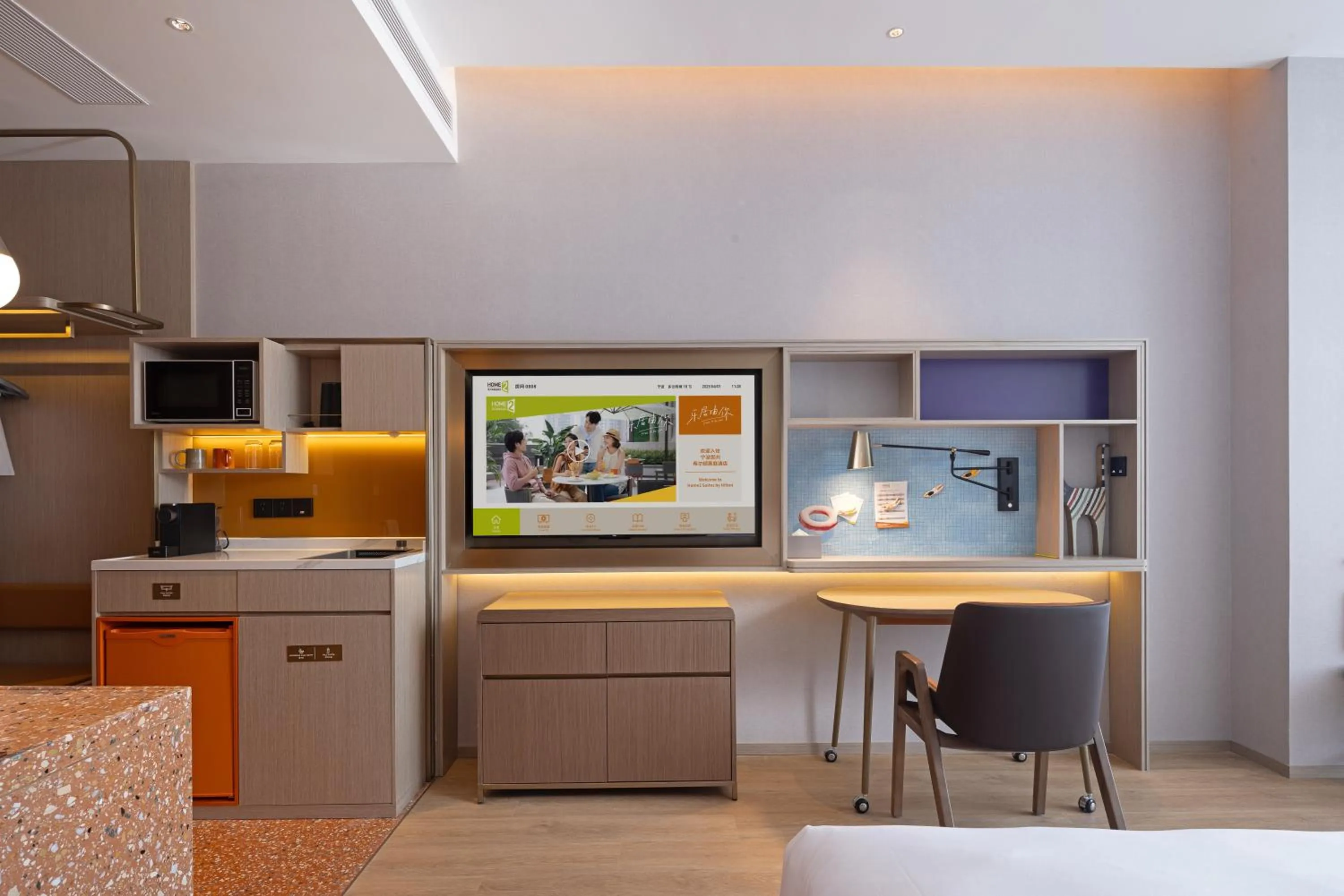 TV and multimedia in Home2 Suite by Hilton Ningbo Yinzhou