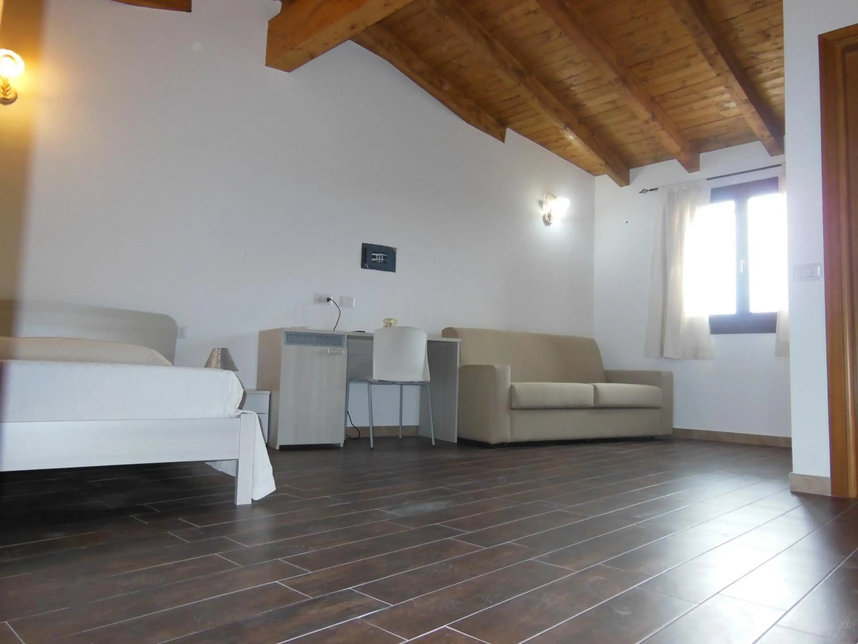 Deluxe Triple Room in B&B Pettirosso Deluxe Triple Room in B&B Pettirosso