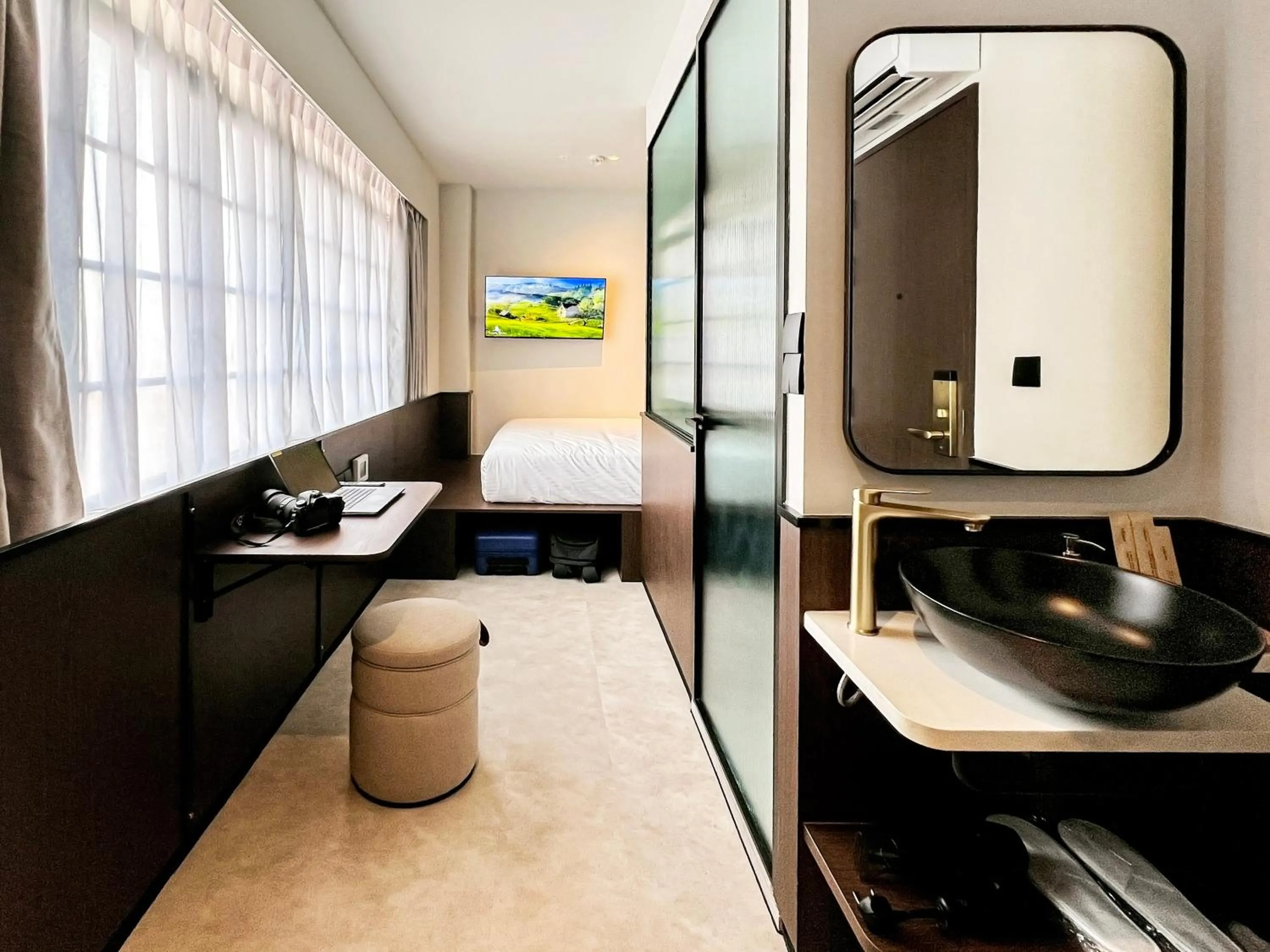 Bedroom in Coliwoo Hotel Kampong Glam - CoLiving