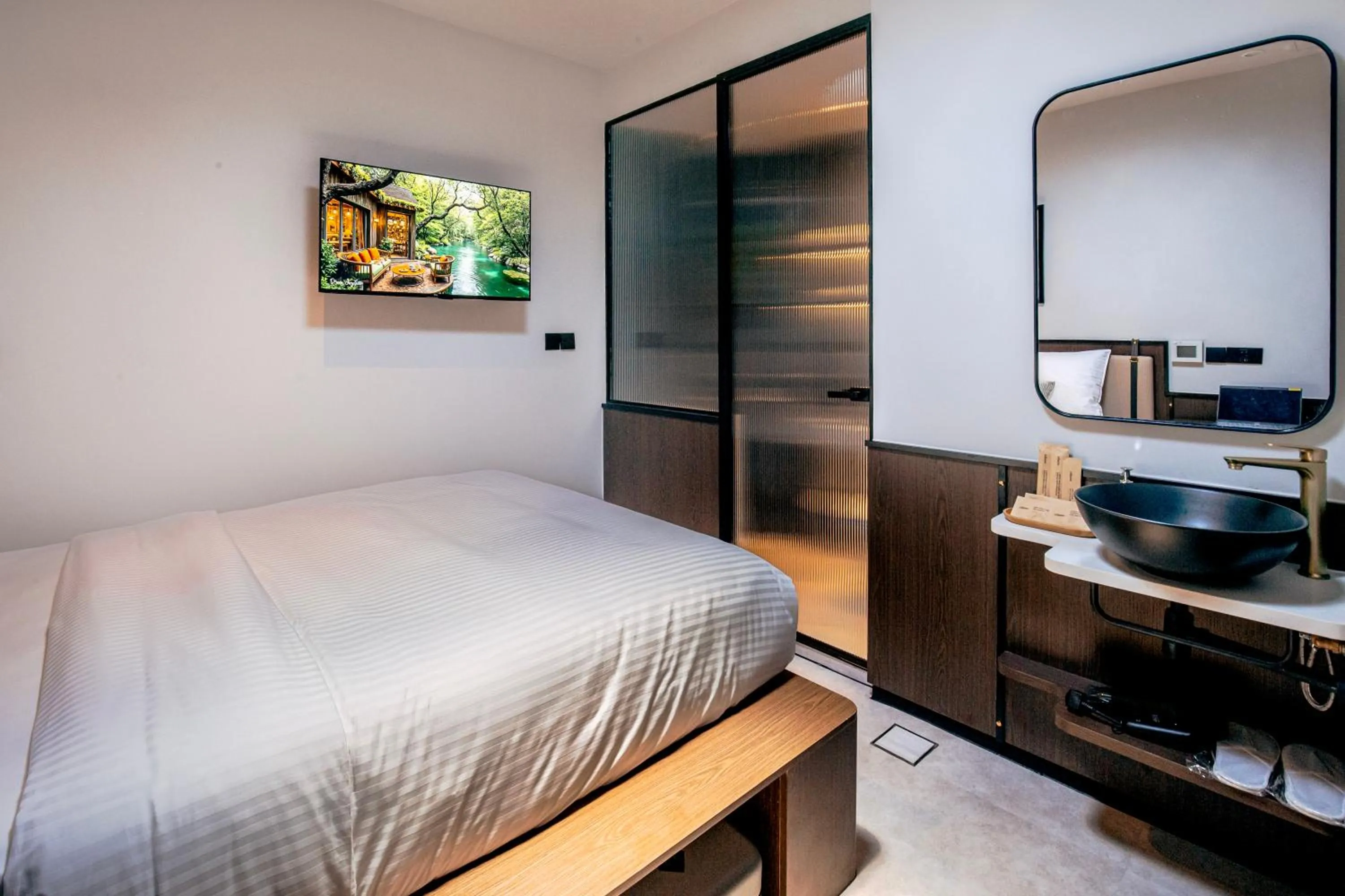 Bedroom, Bed in Coliwoo Hotel Kampong Glam - CoLiving