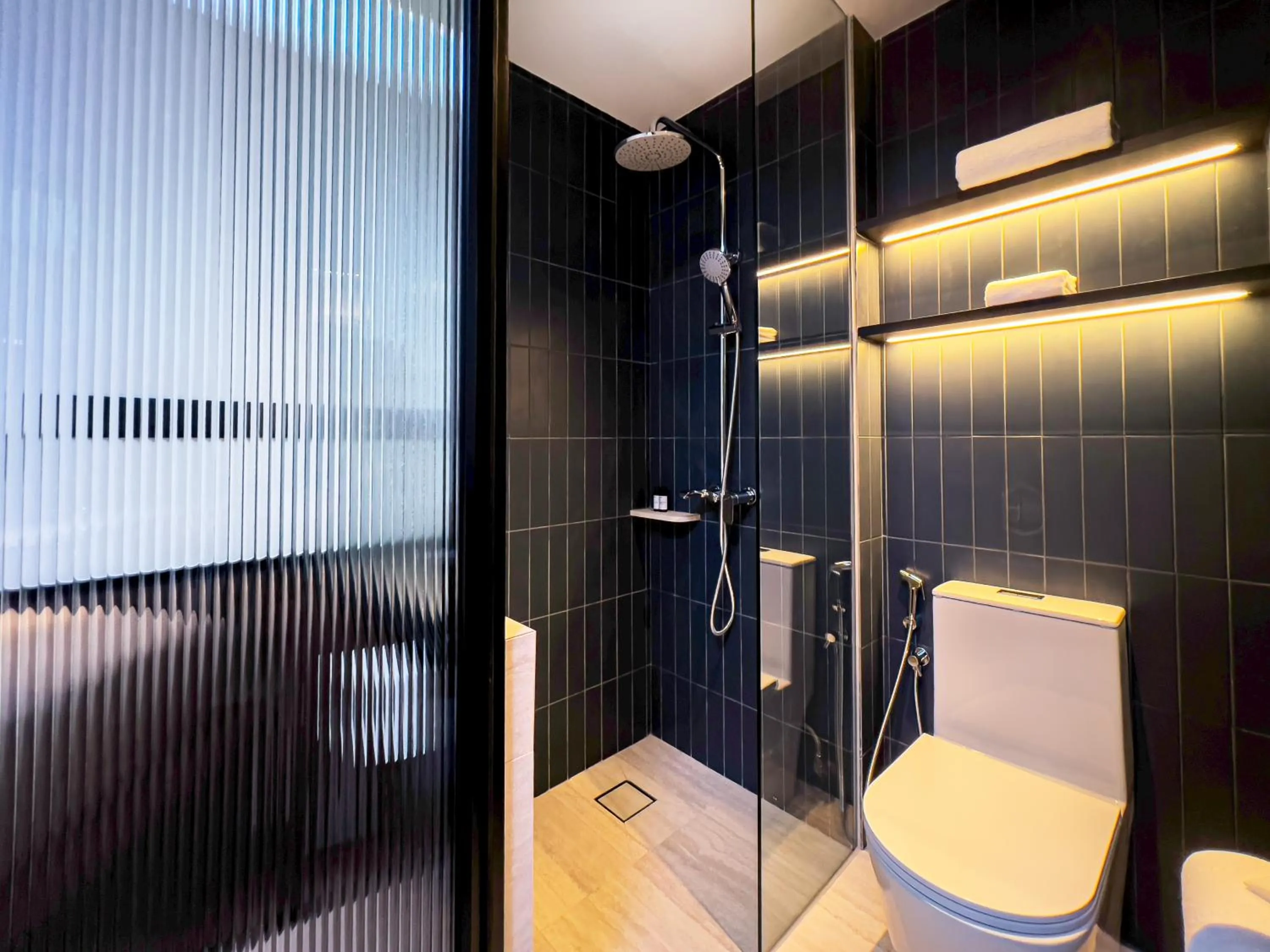 Bathroom in Coliwoo Hotel Kampong Glam - CoLiving