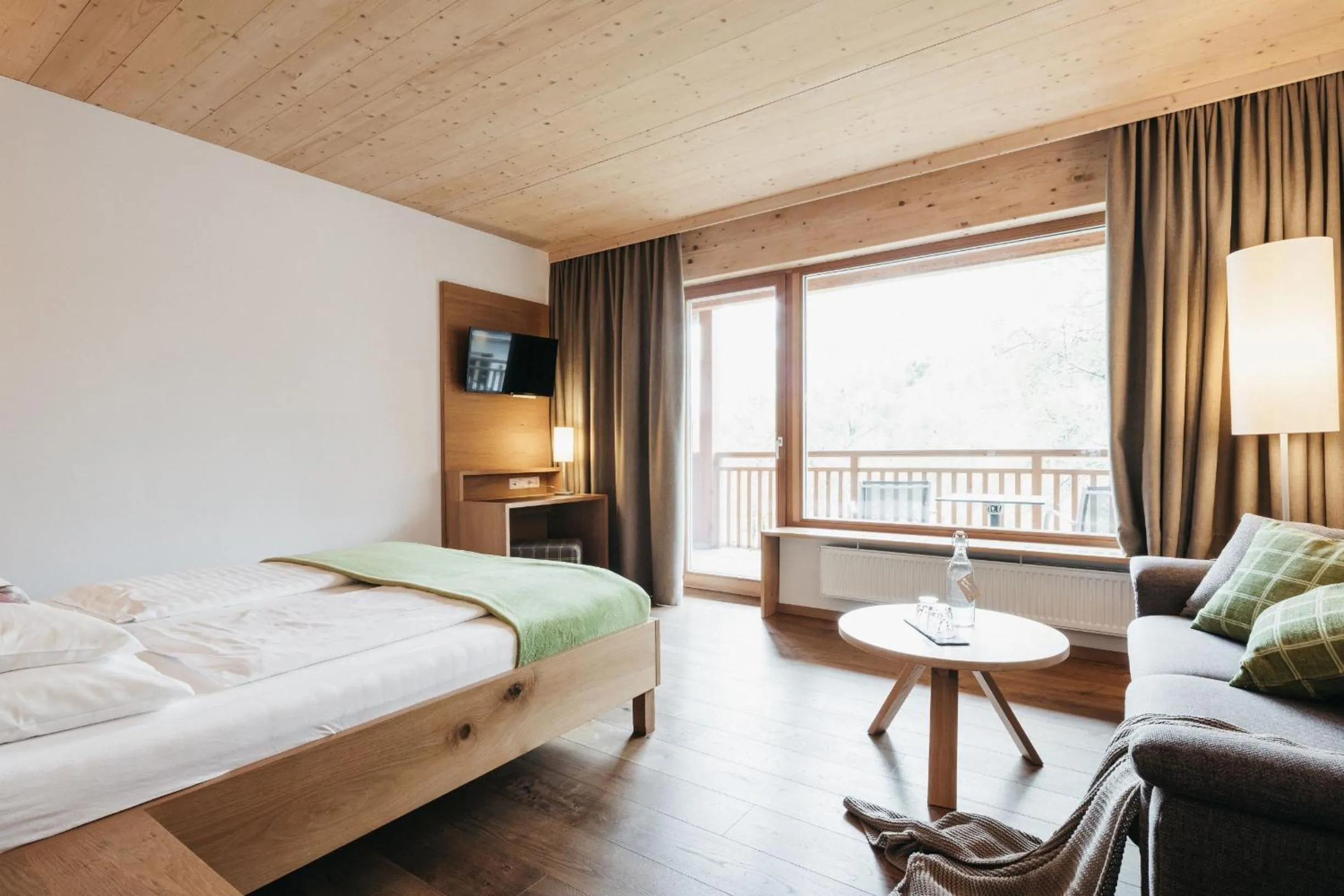 Photo of the whole room, Bed in Naturhotel Bauernhofer