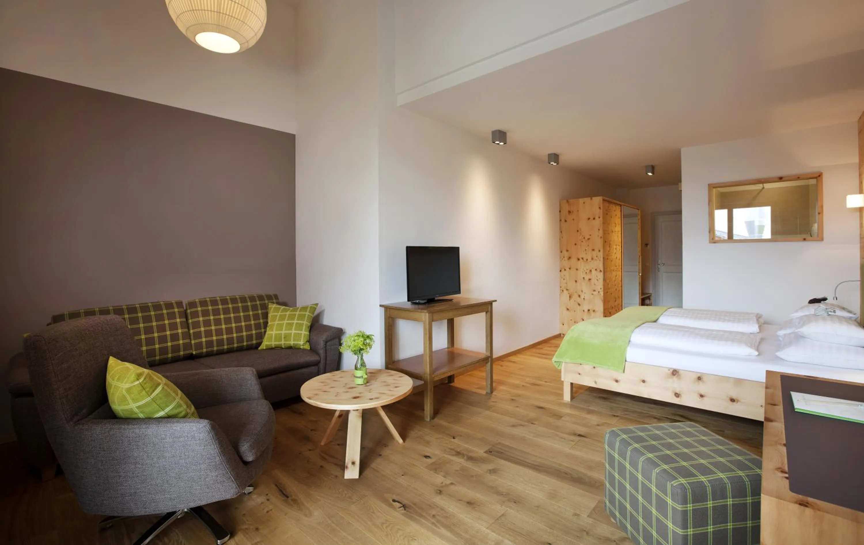 Photo of the whole room, Bed in Naturhotel Bauernhofer