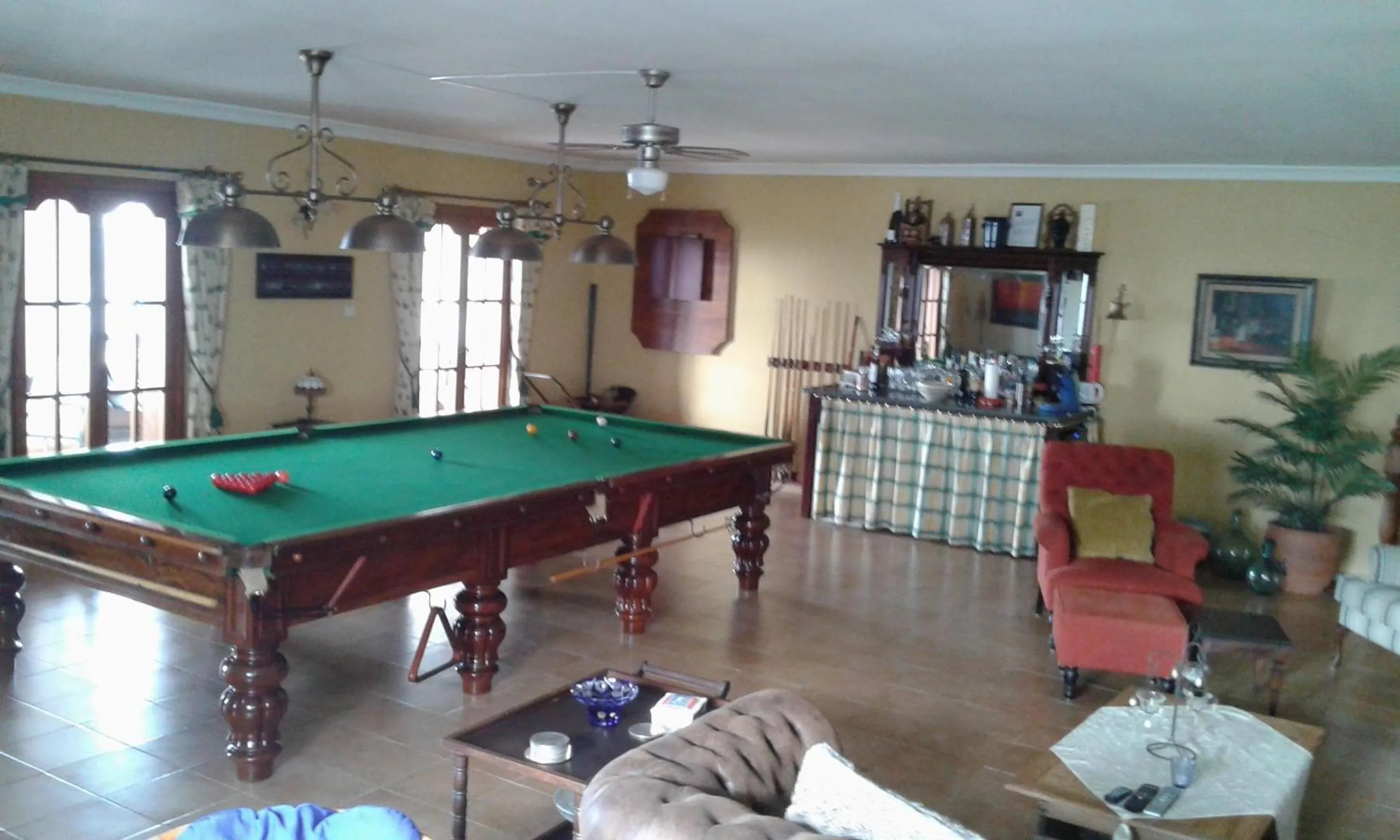 Communal lounge/ TV room in Casa Roble B&B