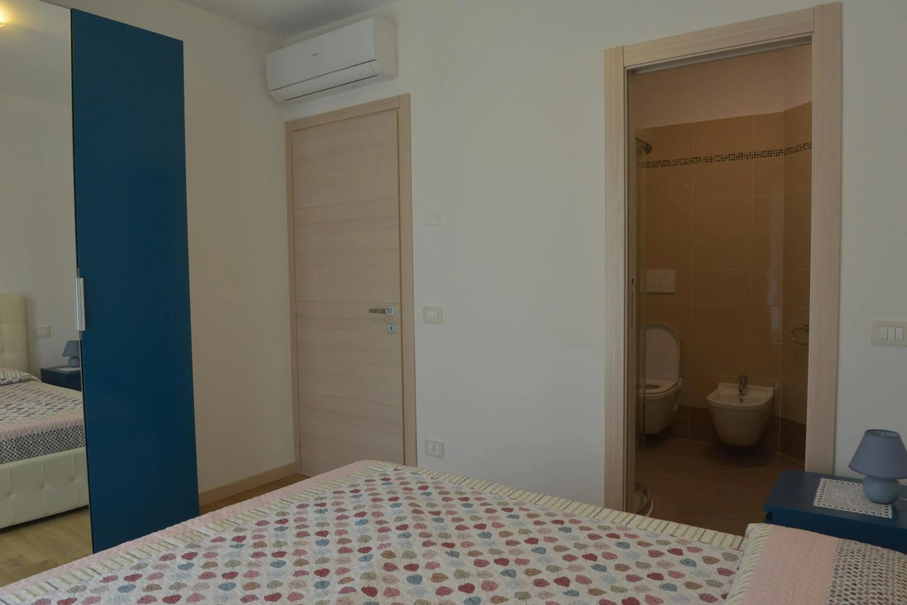 Bed in Villa Artemia