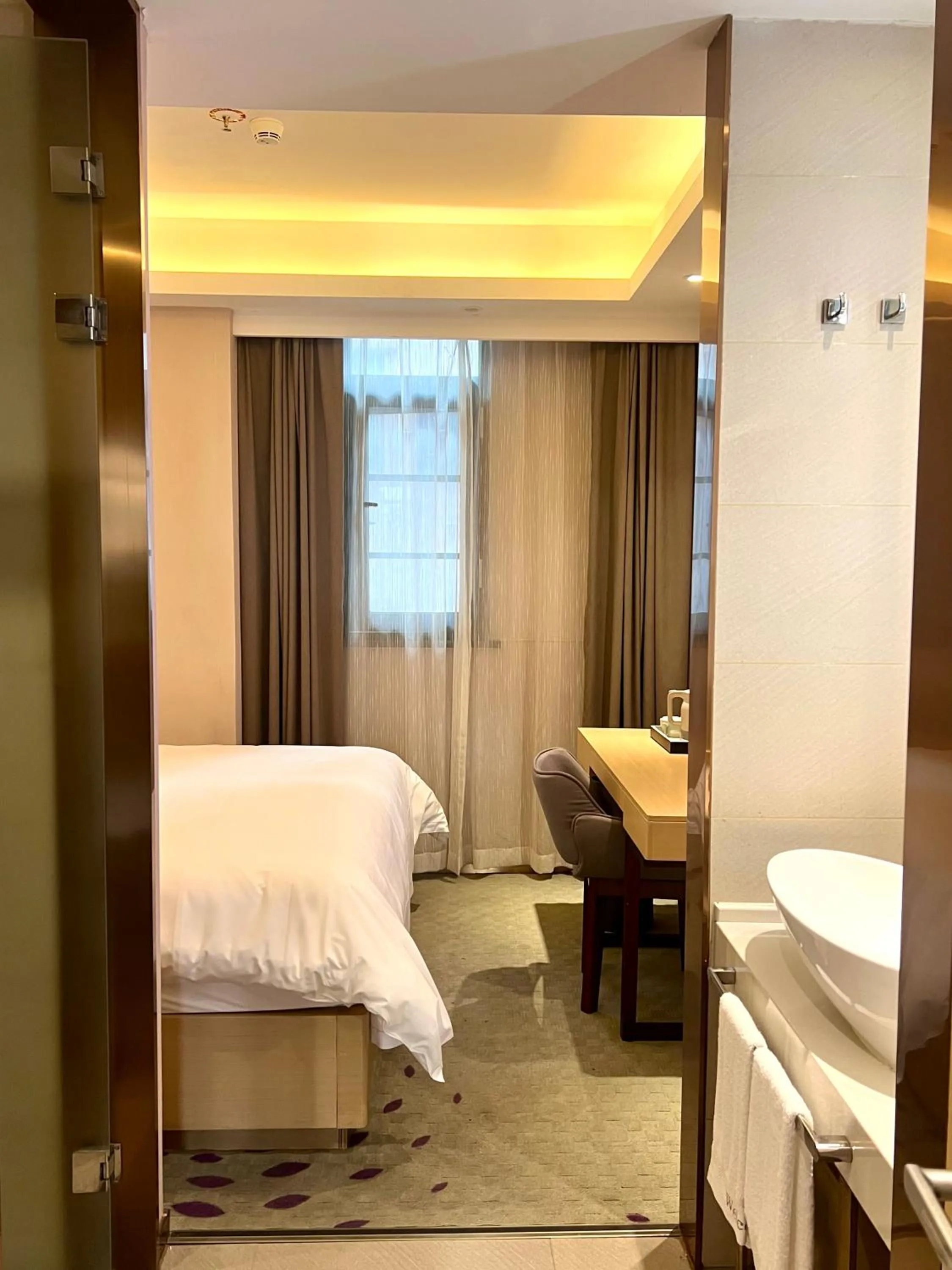 Bed in Lavande Hotel Shenzhen International Convention and Exhibition Center Fuhai West Subway Station