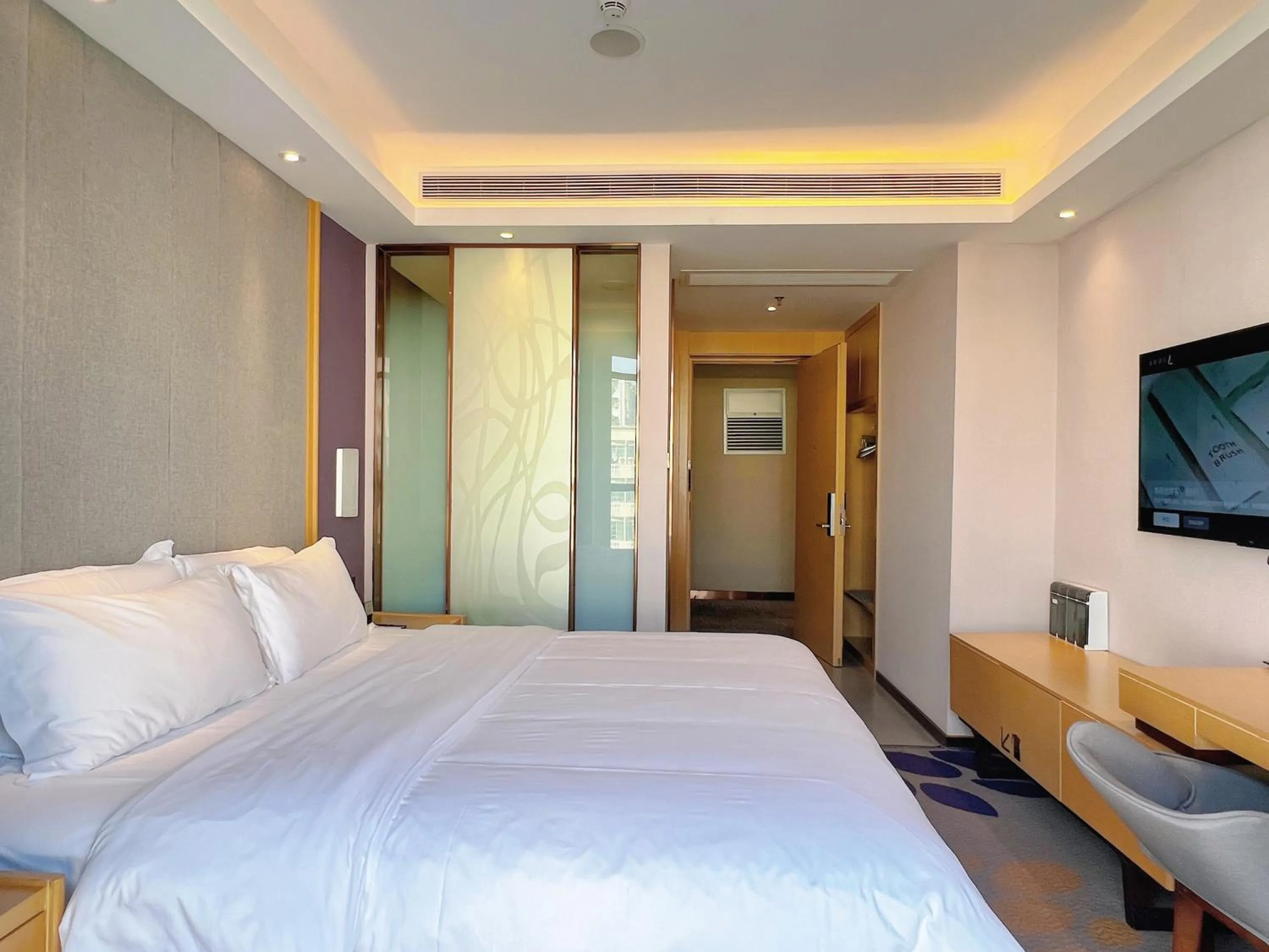 Bed in Lavande Hotel Shenzhen International Convention and Exhibition Center Fuhai West Subway Station