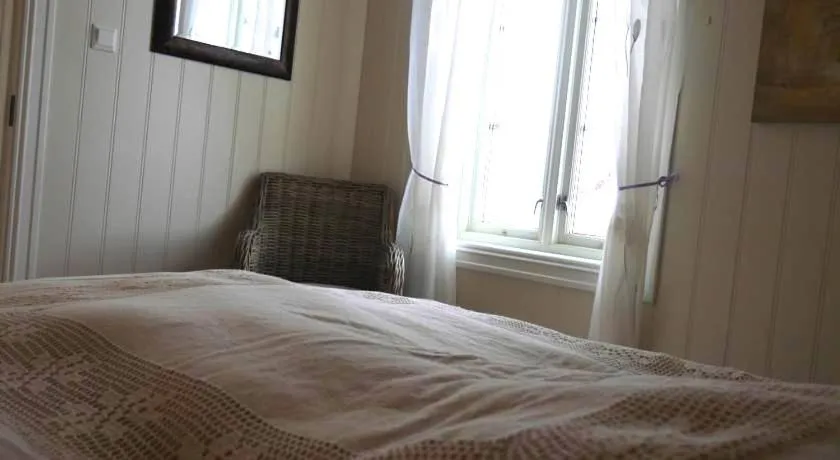 Bed in Jordbærstova Feriehus