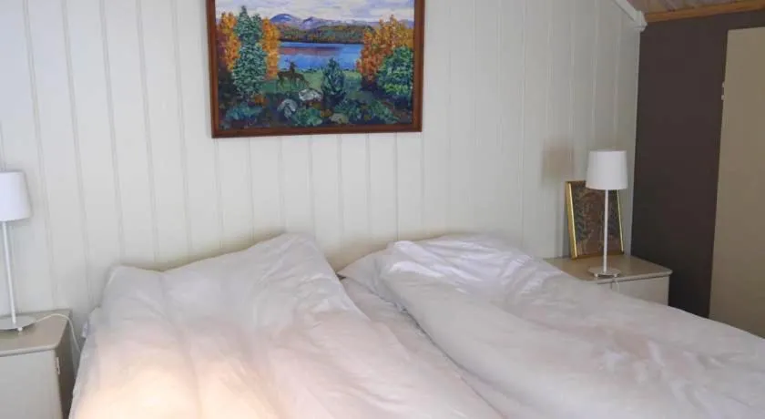 Bed in Jordbærstova Feriehus