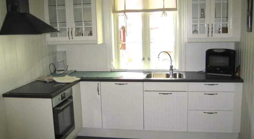 Kitchen or kitchenette in Jordbærstova Feriehus