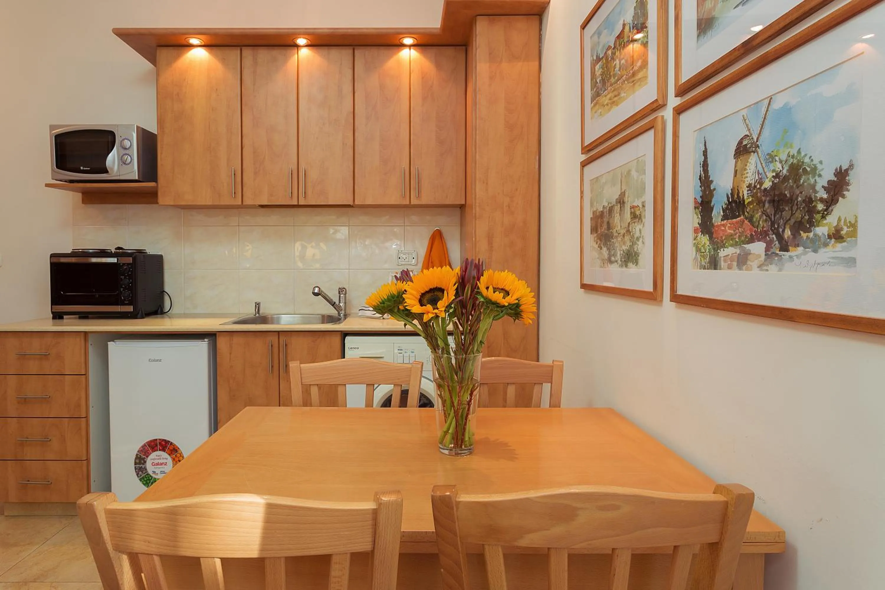 Kitchen or kitchenette in Colony Suites- Hananya St.