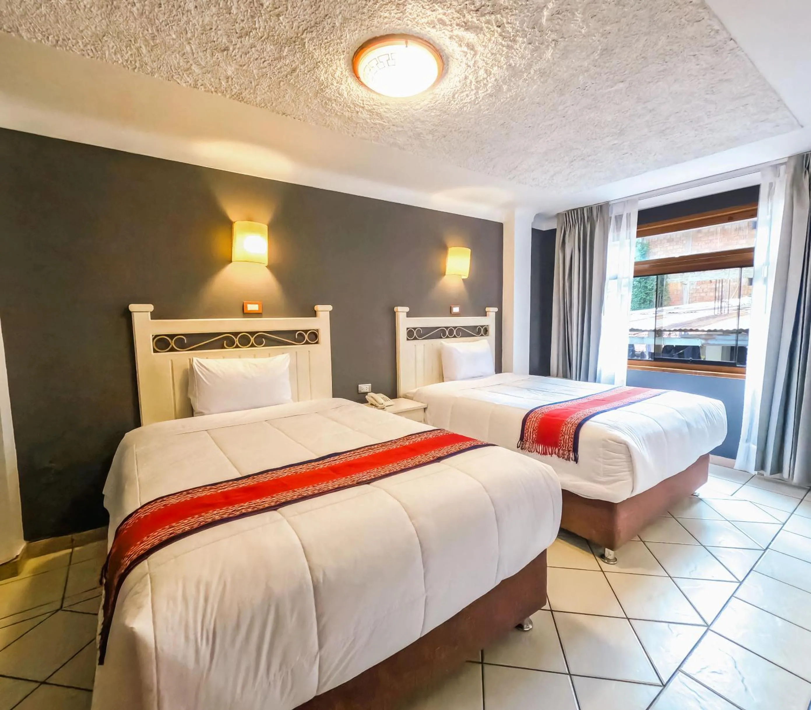 Standard Double Room with Two Double Beds - single occupancy in Hotel Rojas Machupicchu