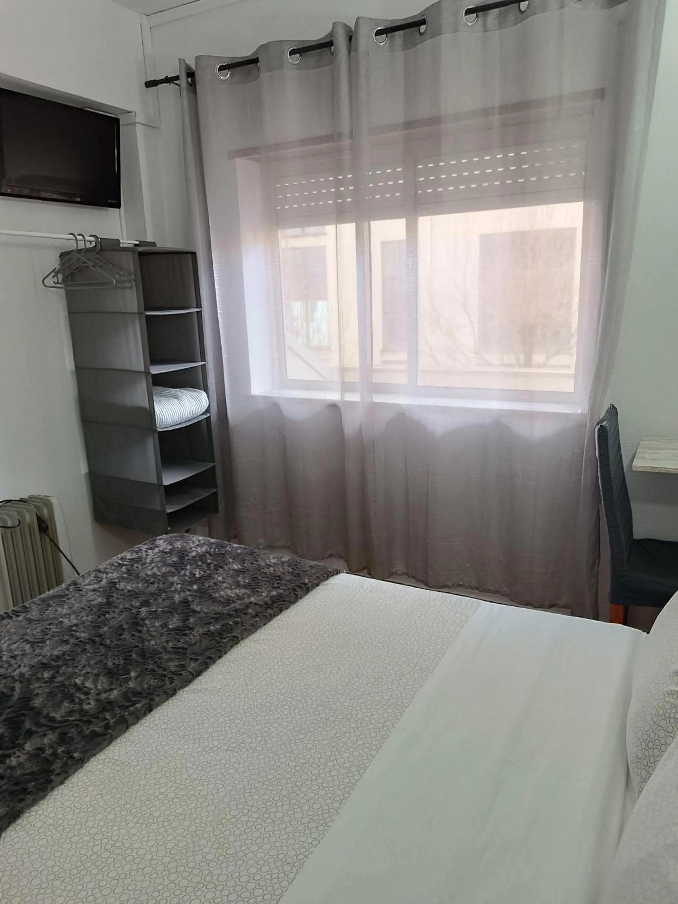 Bedroom, Bed in Residencial S. Gião