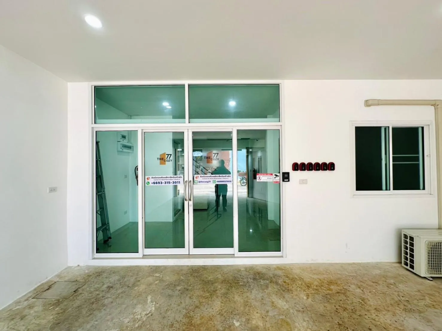 Property building in The Cozy 77