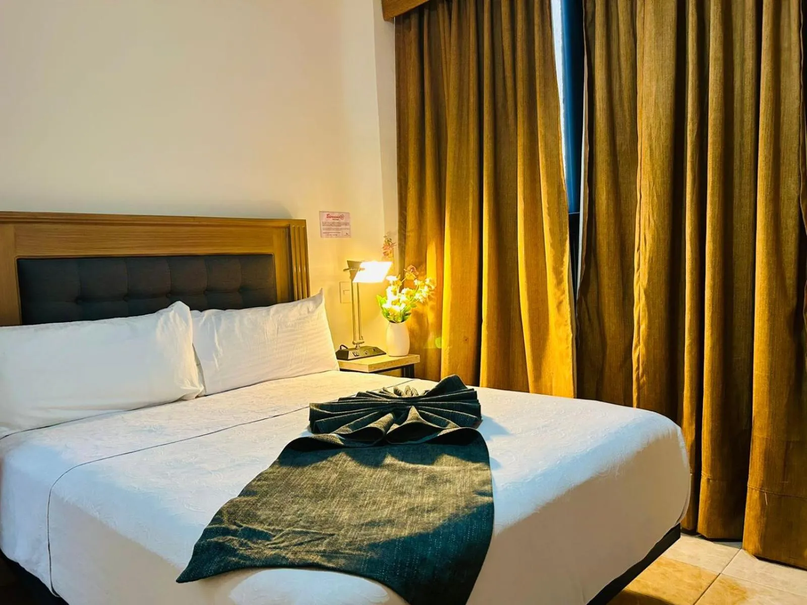 Bed in Hotel Grand Lion