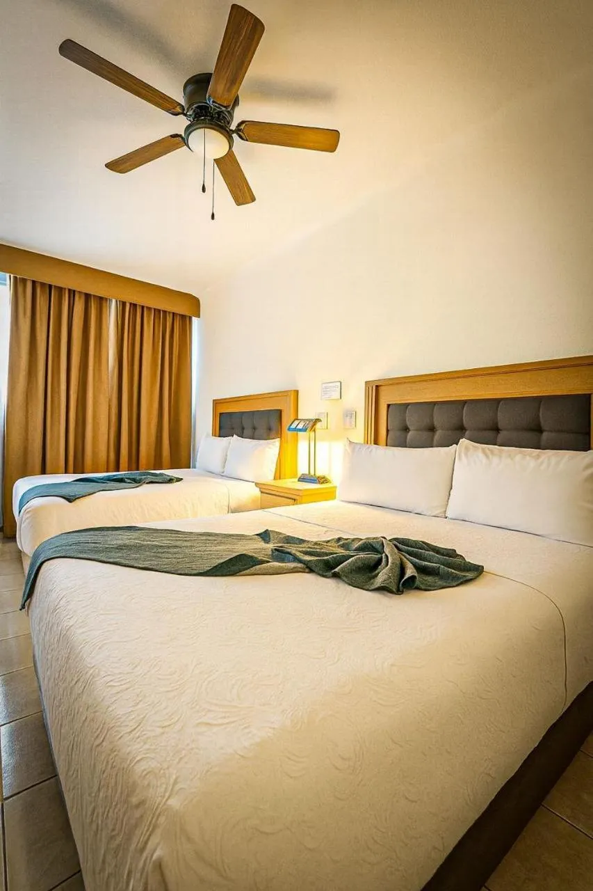 Bed in Hotel Grand Lion