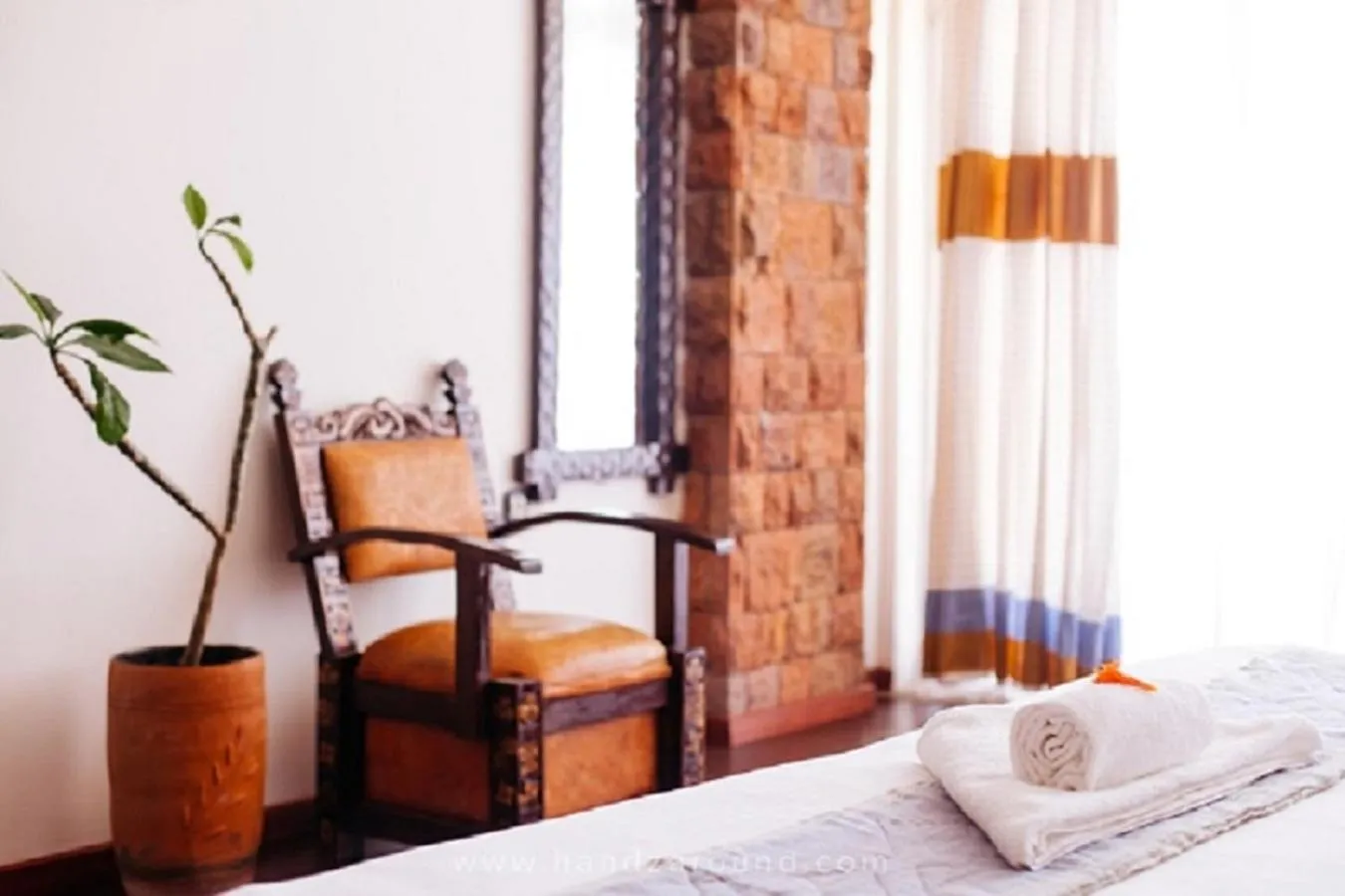 Seating area, Bed in Maribela Hotel