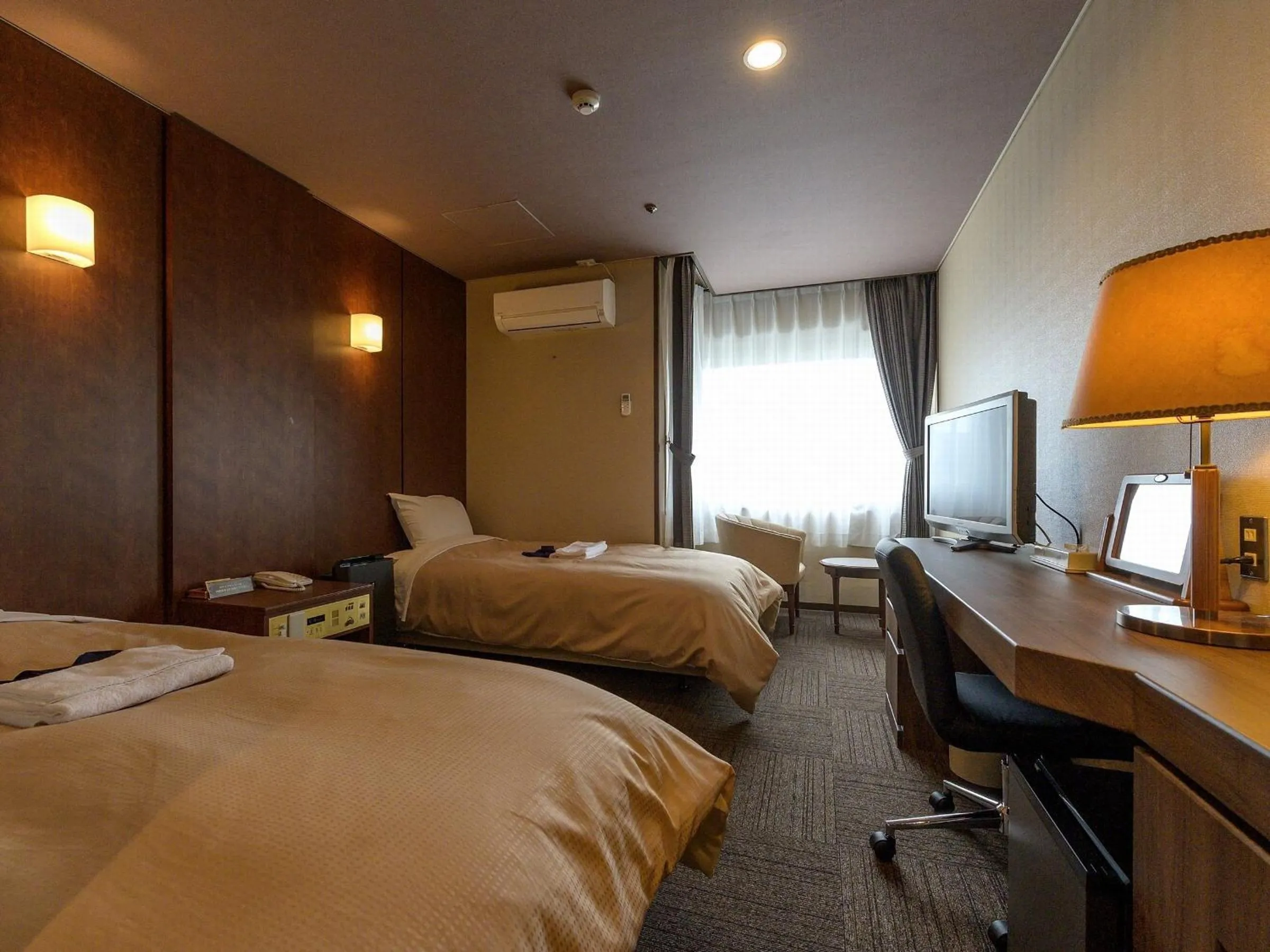 Bed in ホテル京都エミナースManyonoyuHotelKyotoEminence