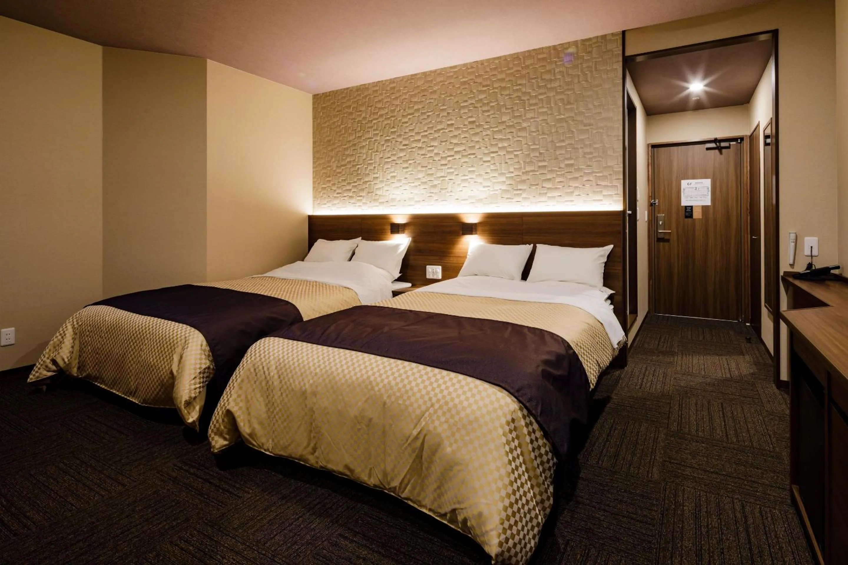 Bed in ホテル京都エミナースManyonoyuHotelKyotoEminence