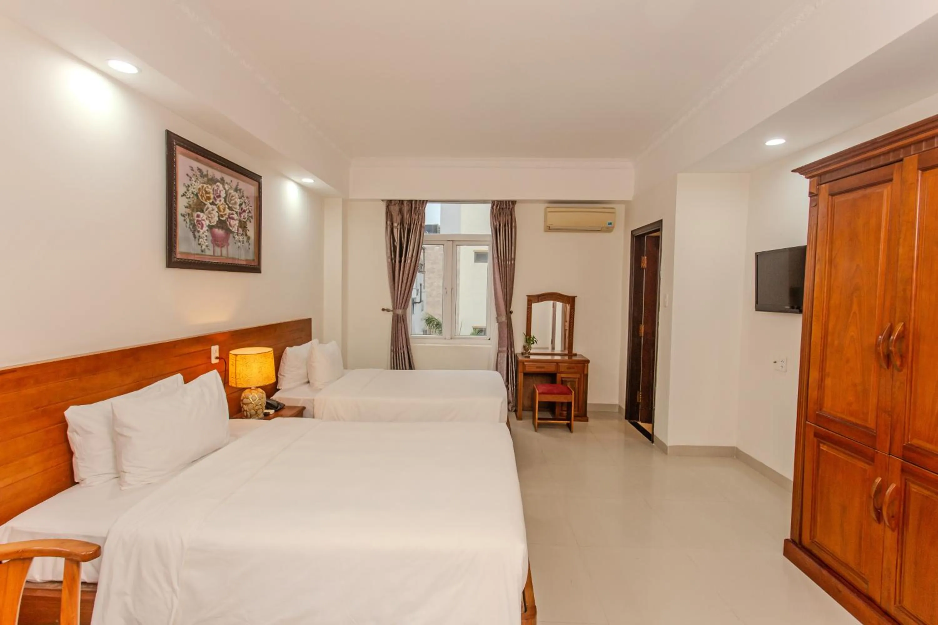 Photo of the whole room, Bed in Seavitel Danang Beach Hotel