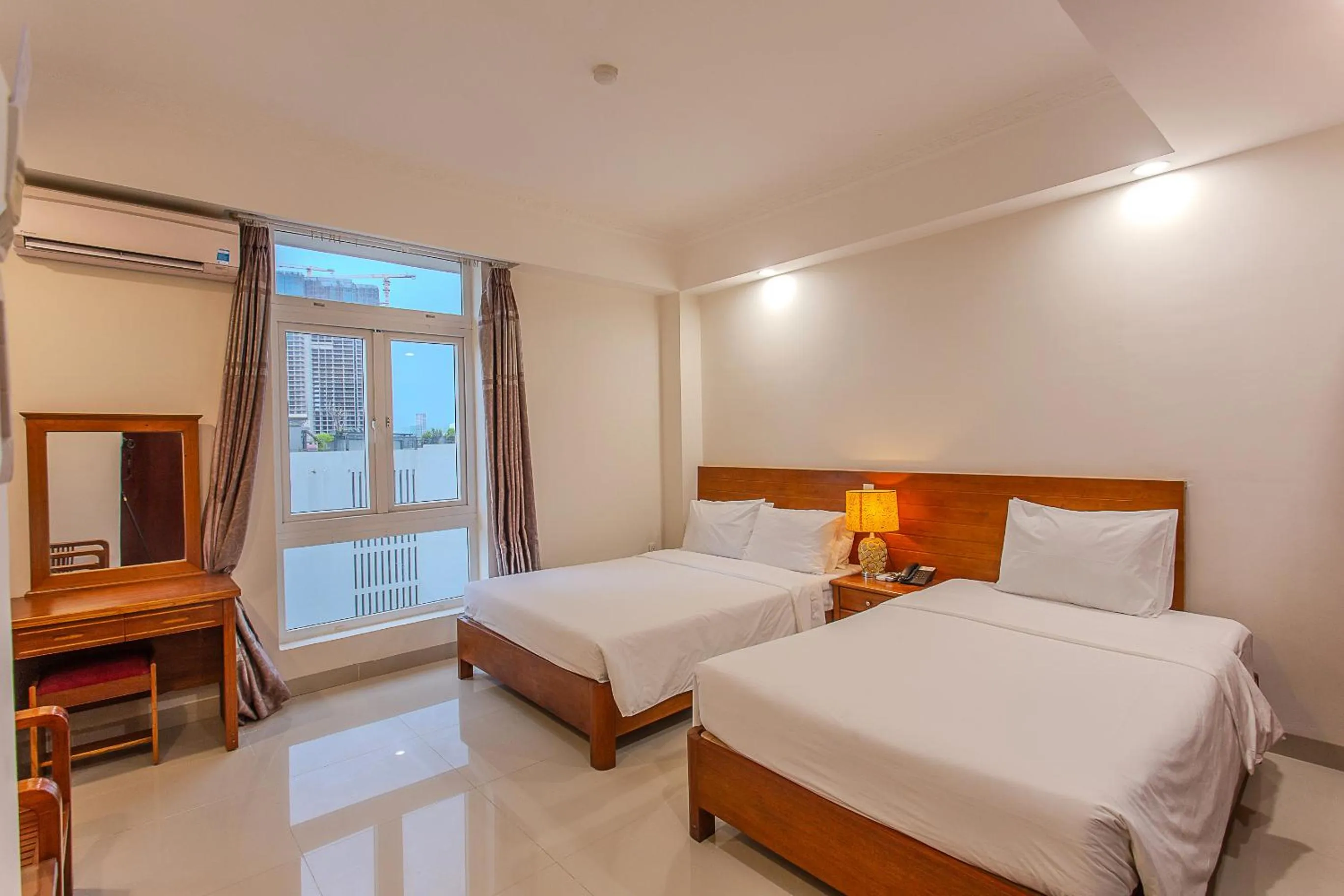 Photo of the whole room, Bed in Seavitel Danang Beach Hotel