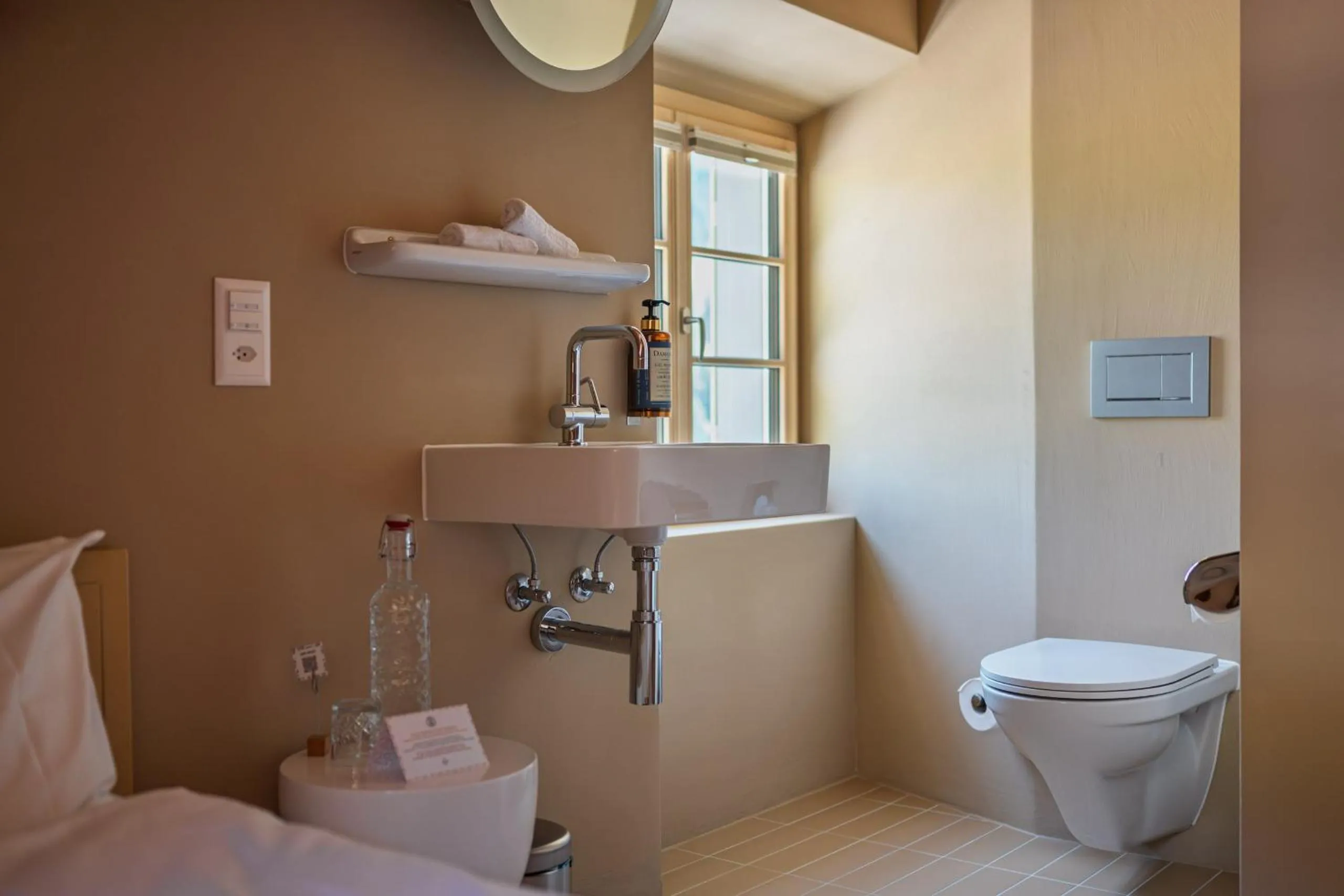 Toilet in Speluca Brauerei & Genusshotel - Self-Check-in